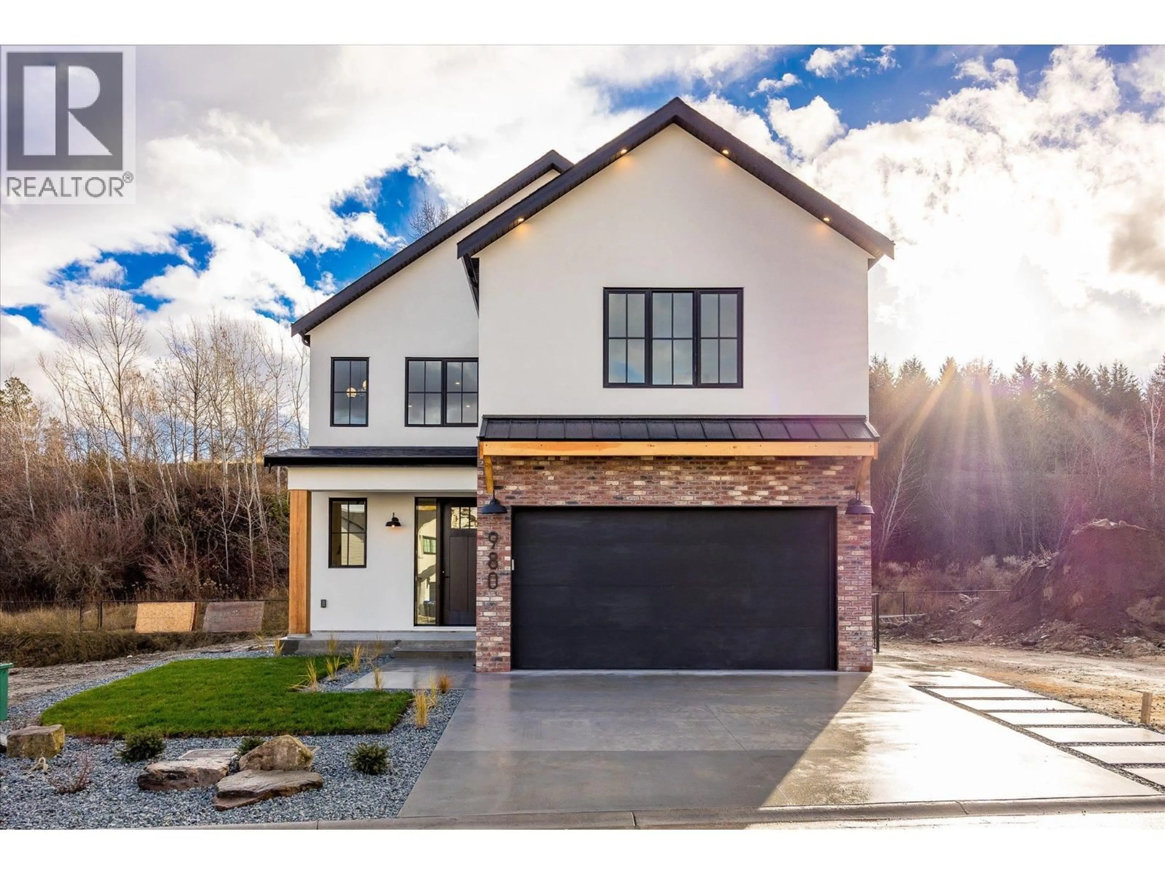 Home with brick exterior material, street for 980 BULL CRESCENT, Kelowna British Columbia V1W0E6