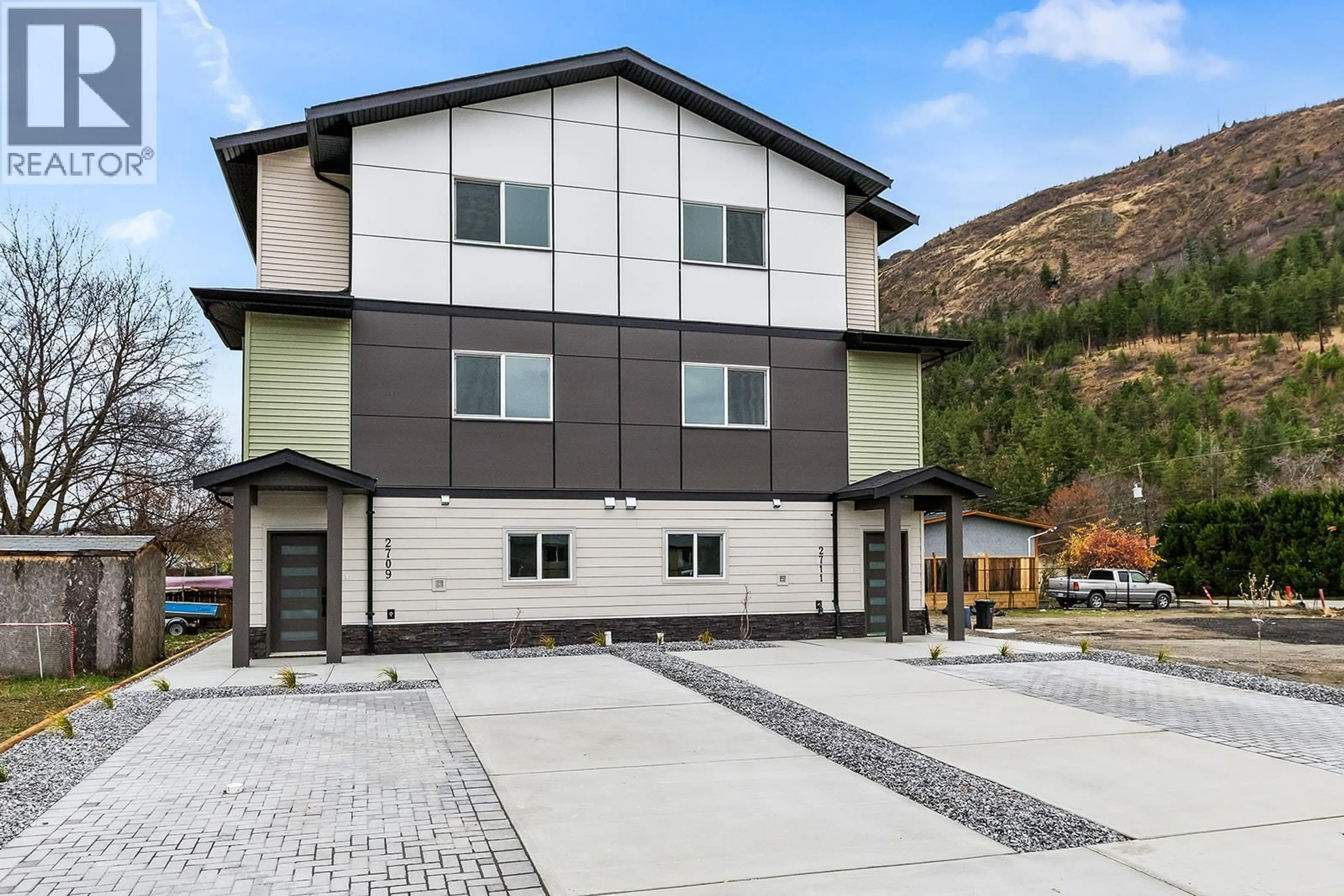 Home with vinyl exterior material, mountain view for 2709 HEWL ROAD, West Kelowna British Columbia V1Z2M5