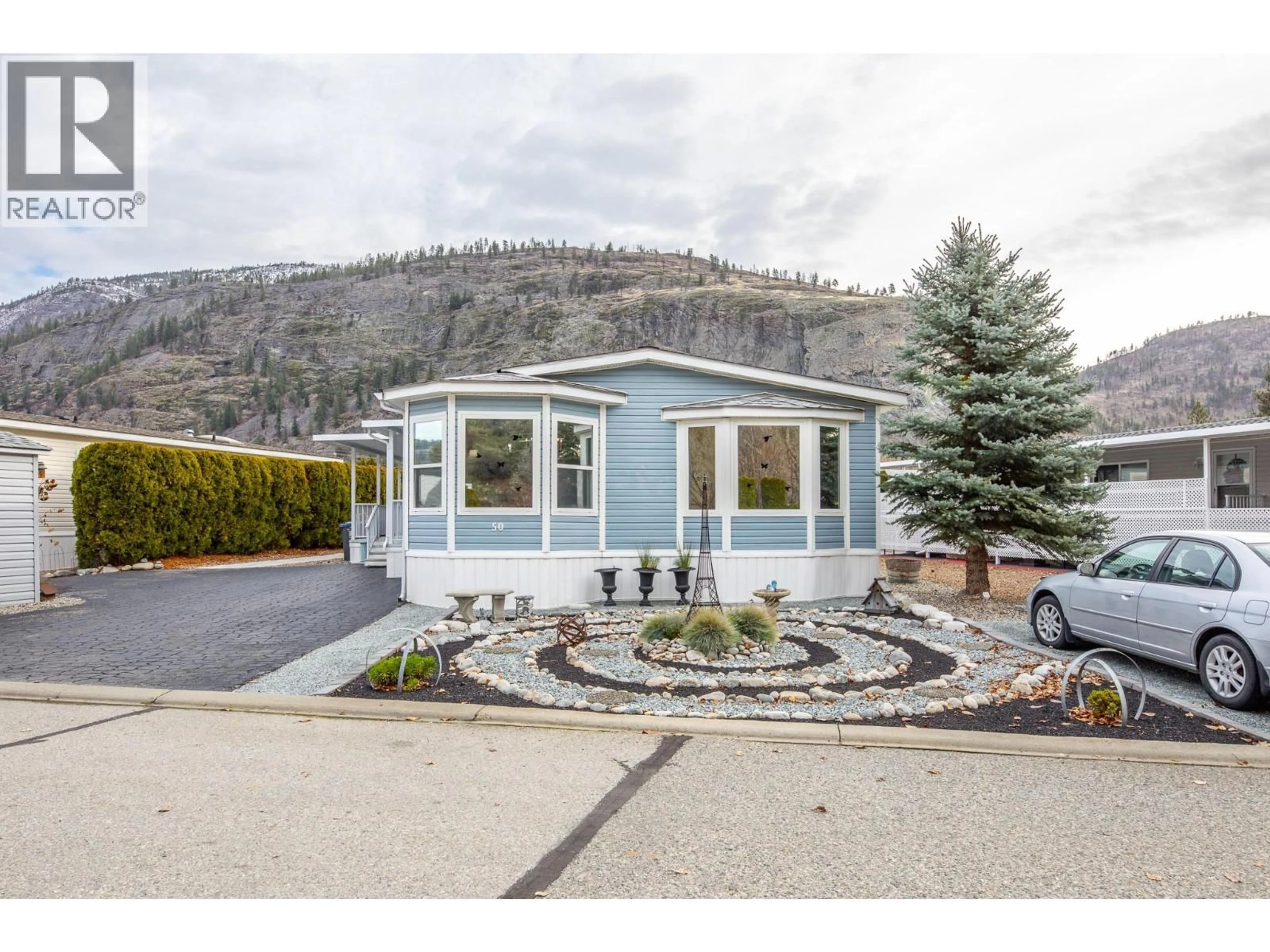 Home with vinyl exterior material, mountain view for 50 - 8598 HWY 97 OTHER, Oliver British Columbia V0H1T2