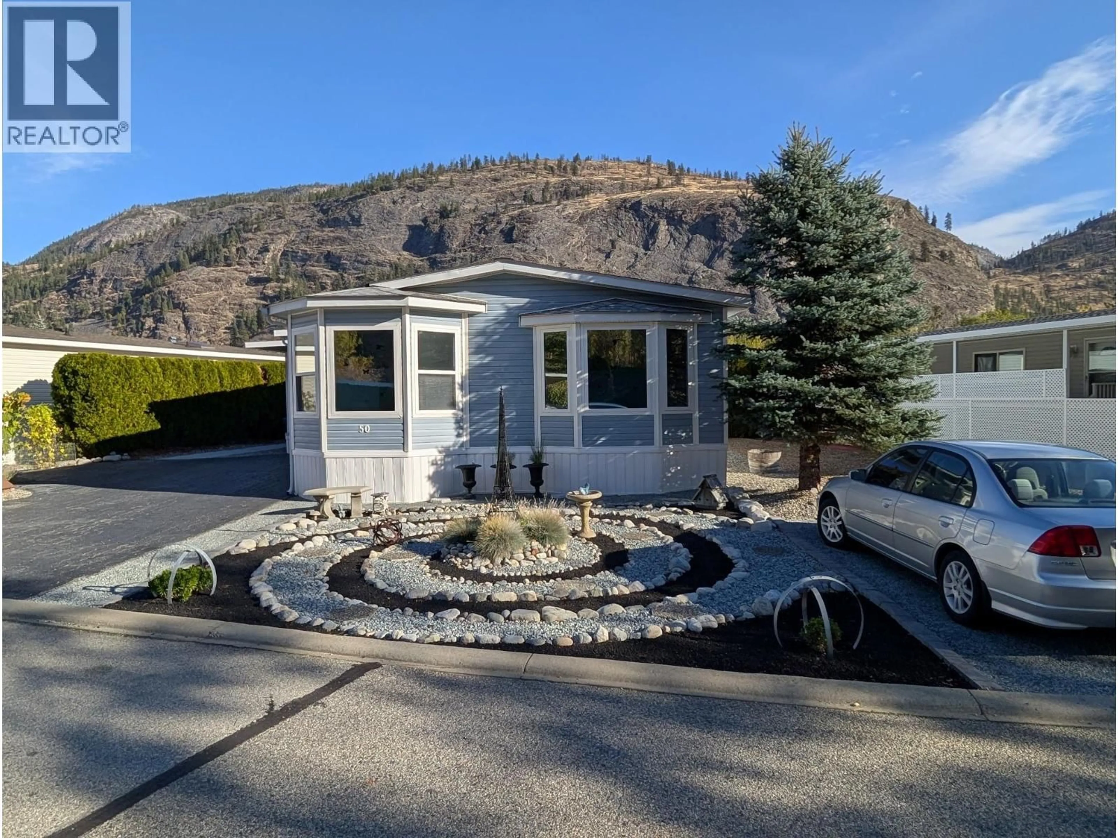 Home with vinyl exterior material, mountain view for 50 - 8598 HWY 97 OTHER, Oliver British Columbia V0H1T2