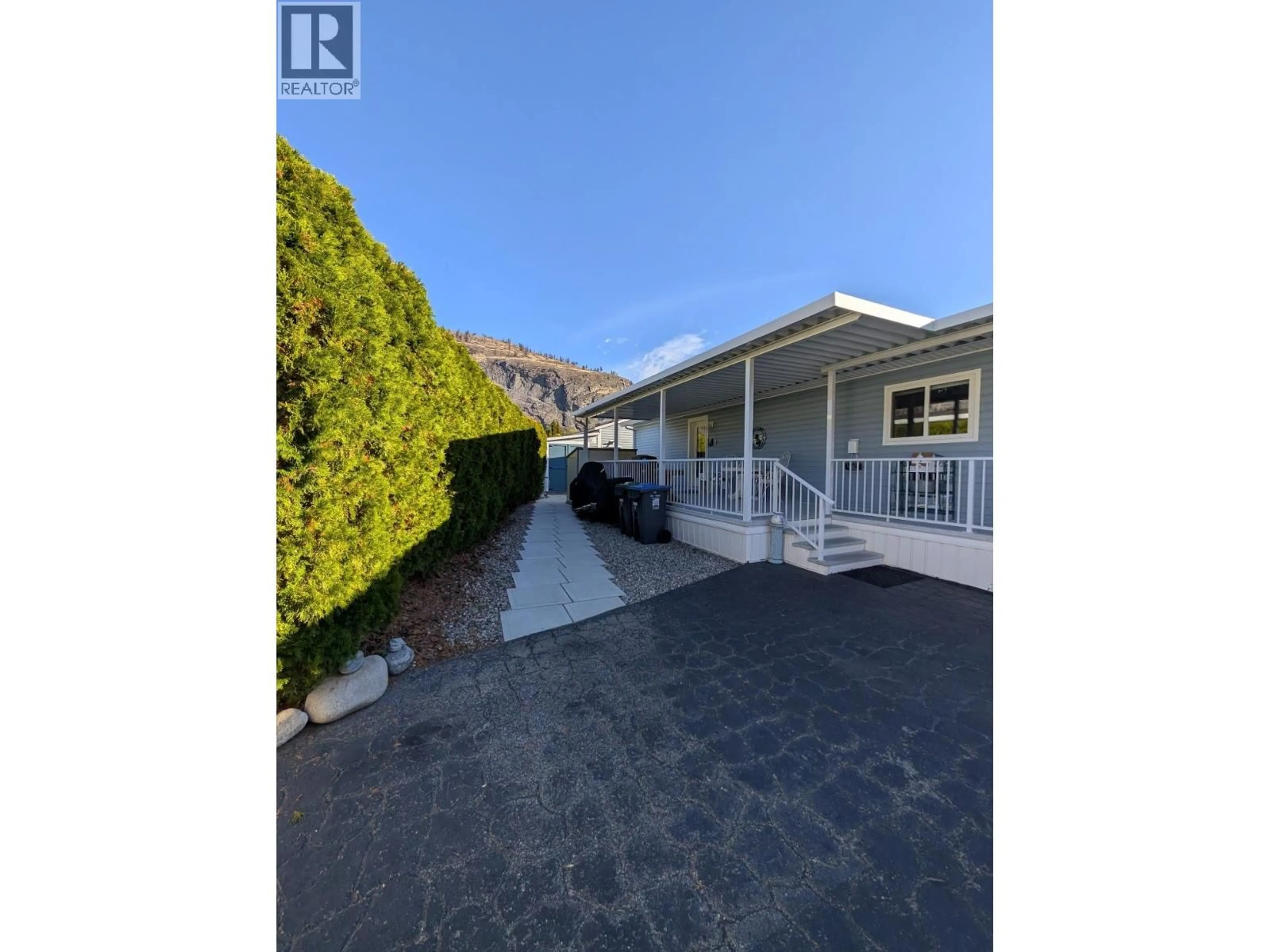 A pic from outside/outdoor area/front of a property/back of a property/a pic from drone, street for 50 - 8598 HWY 97 OTHER, Oliver British Columbia V0H1T2