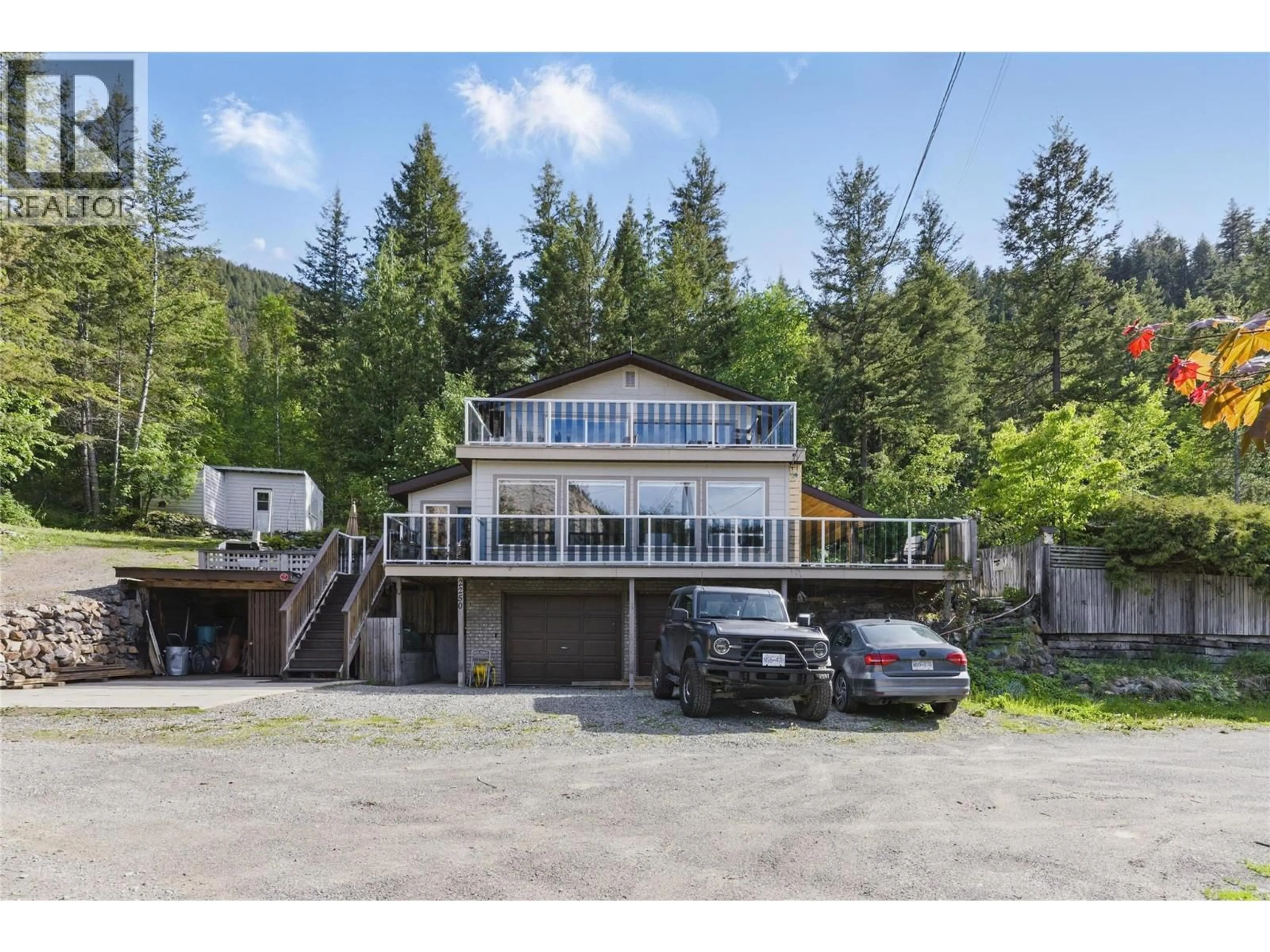 A pic from outside/outdoor area/front of a property/back of a property/a pic from drone, mountain view for 2250 PAUL LAKE ROAD, Kamloops British Columbia V2H1N9