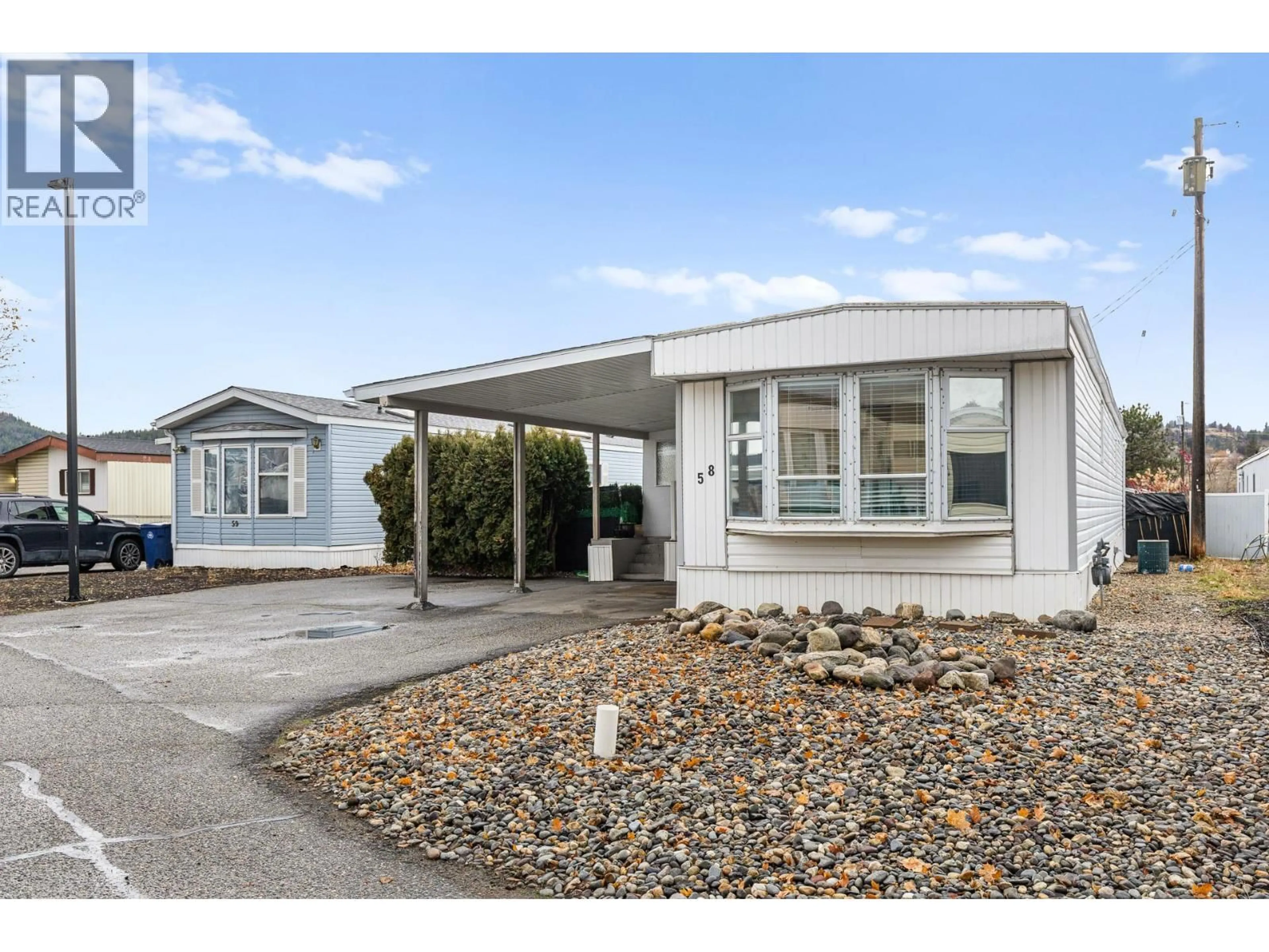 Home with vinyl exterior material, street for 58 - 9020 JIM BAILEY ROAD, Kelowna British Columbia V4V1E5