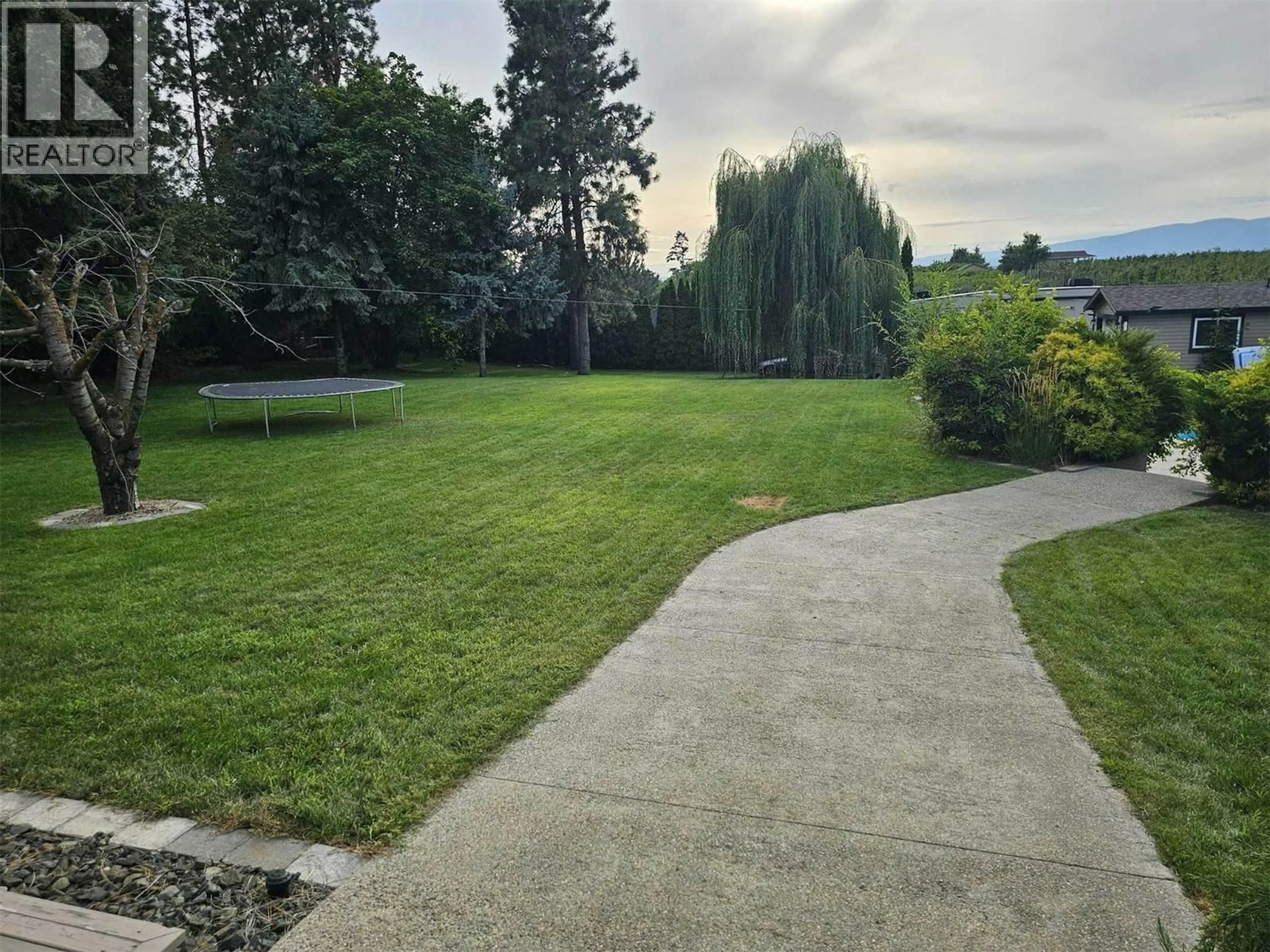 A pic from outside/outdoor area/front of a property/back of a property/a pic from drone, unknown for 3576 ROSE ROAD, Kelowna British Columbia V1W4G5