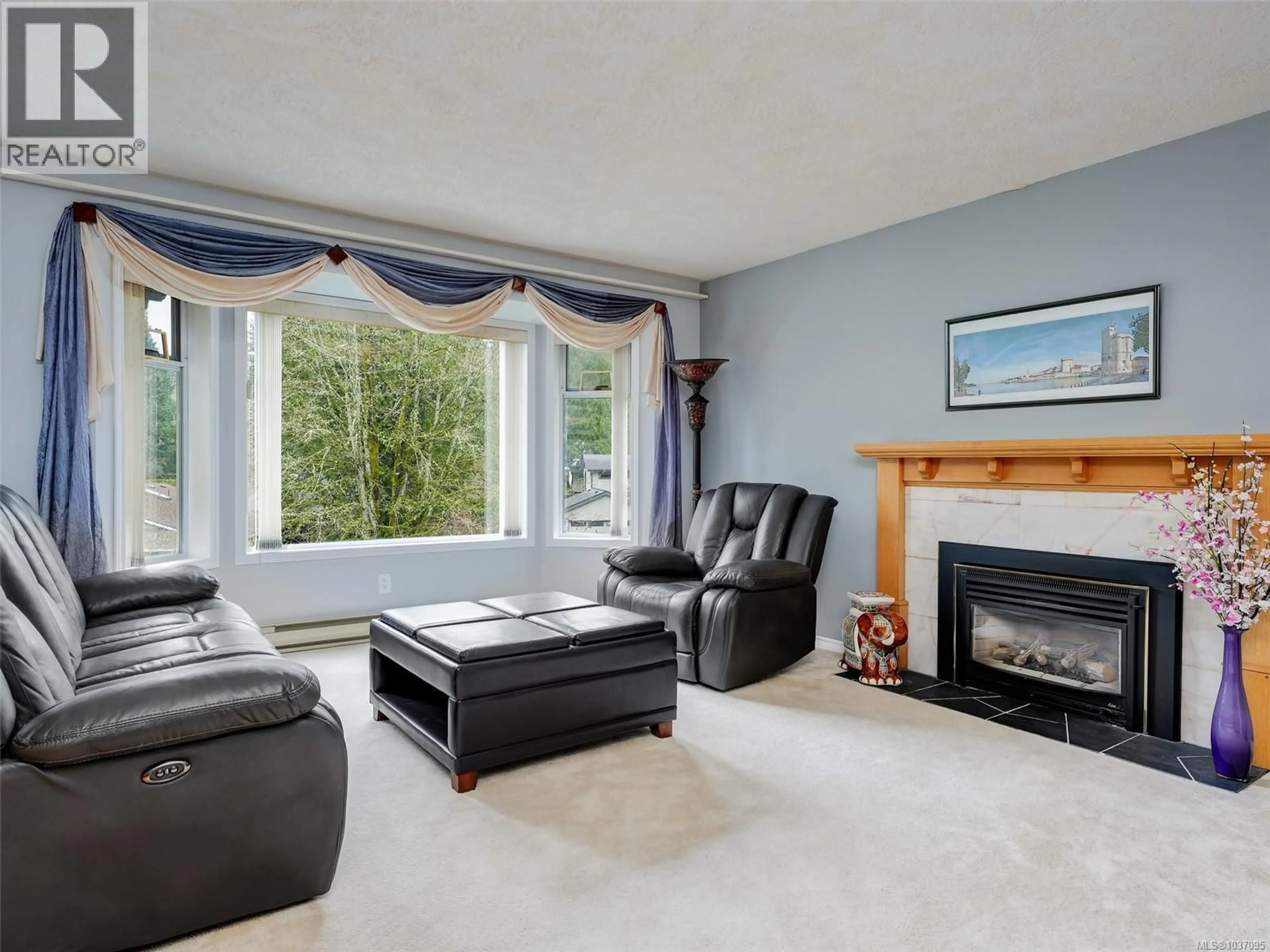 Living room with furniture, unknown for 6781 AMWELL DRIVE, Central Saanich British Columbia V8M1A1