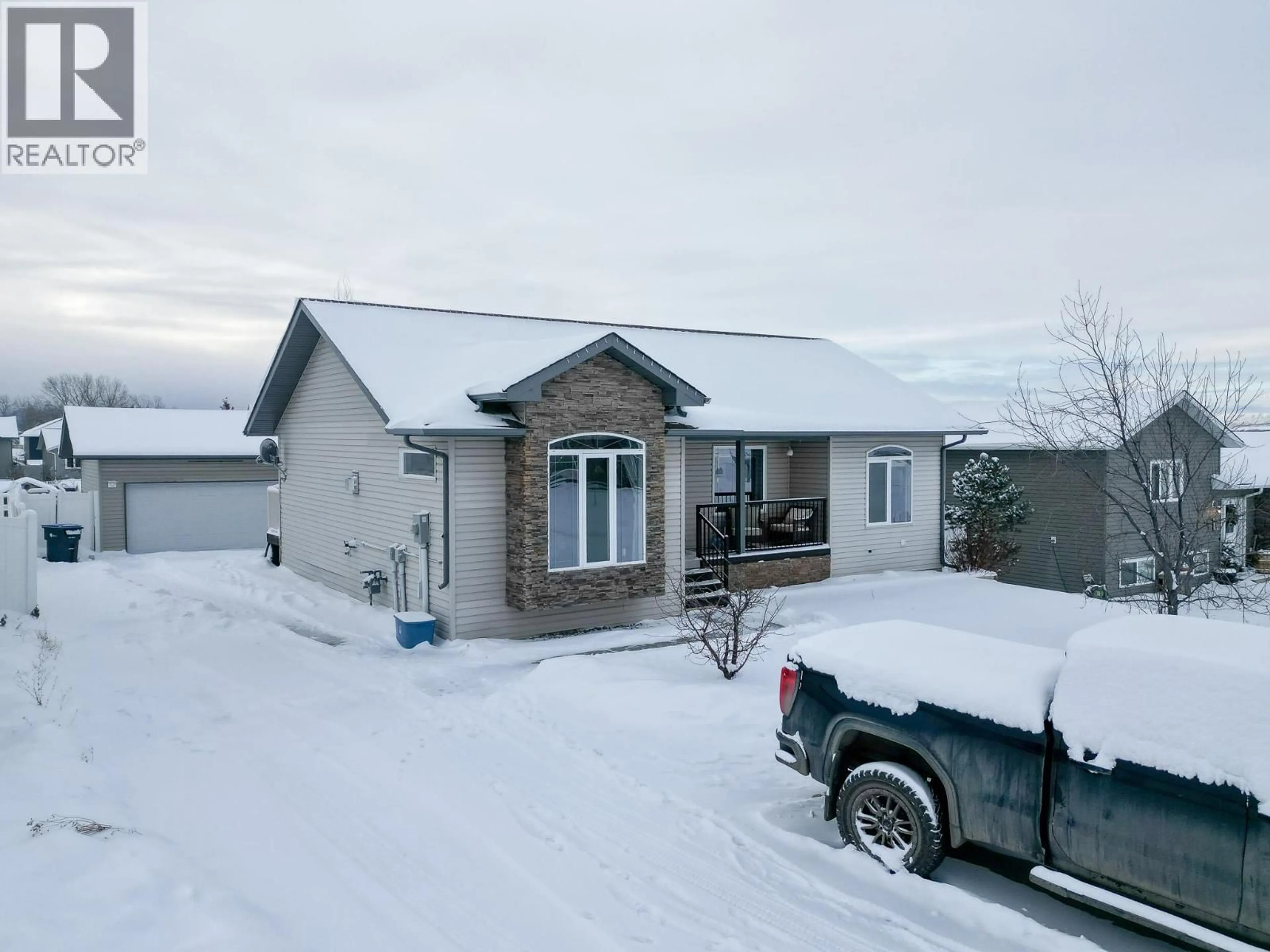 A pic from outside/outdoor area/front of a property/back of a property/a pic from drone, street for 1717 87 AVENUE, Dawson Creek British Columbia V1G0B2