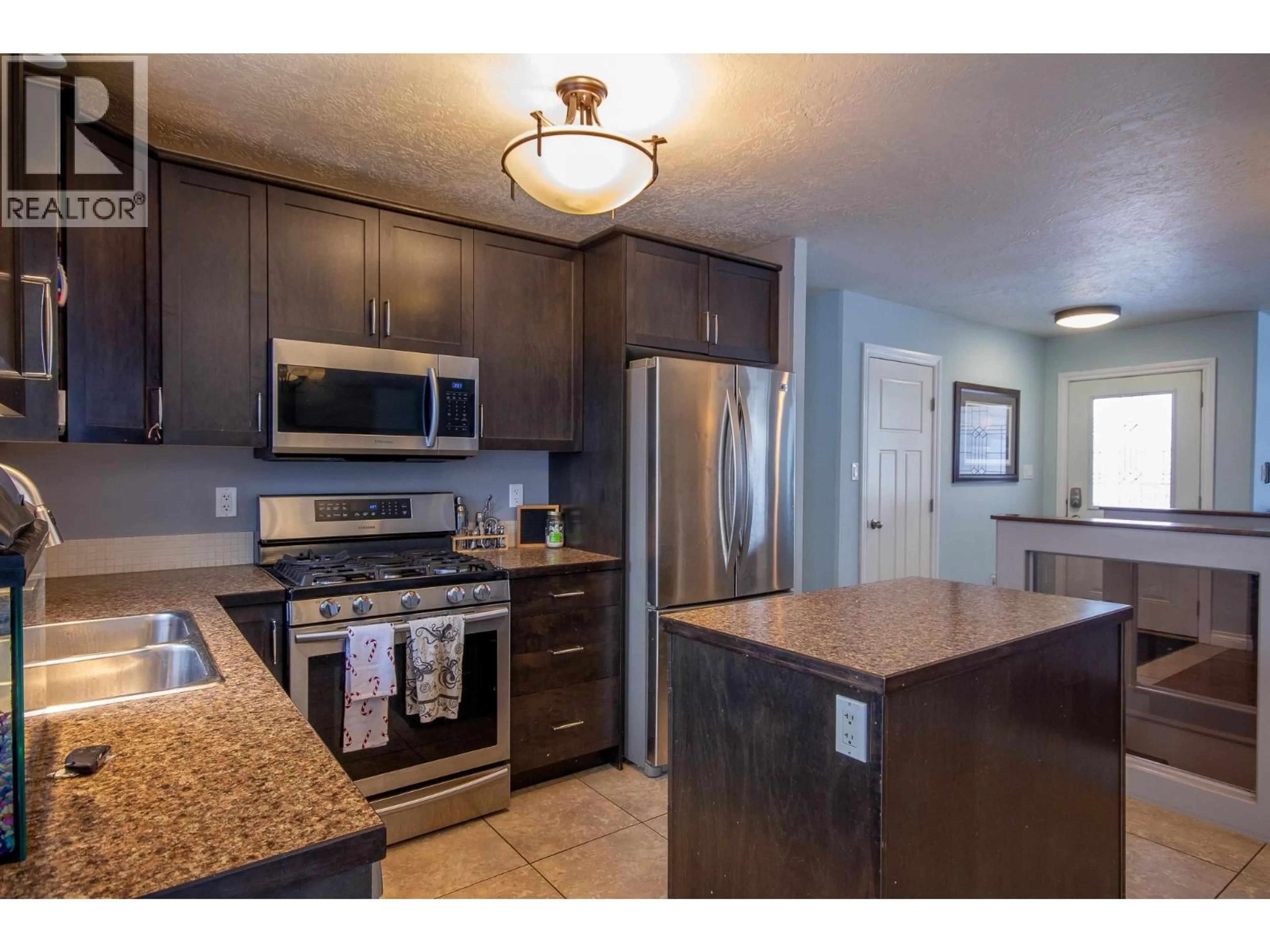 Standard kitchen, ceramic/tile floor for 1717 87 AVENUE, Dawson Creek British Columbia V1G0B2