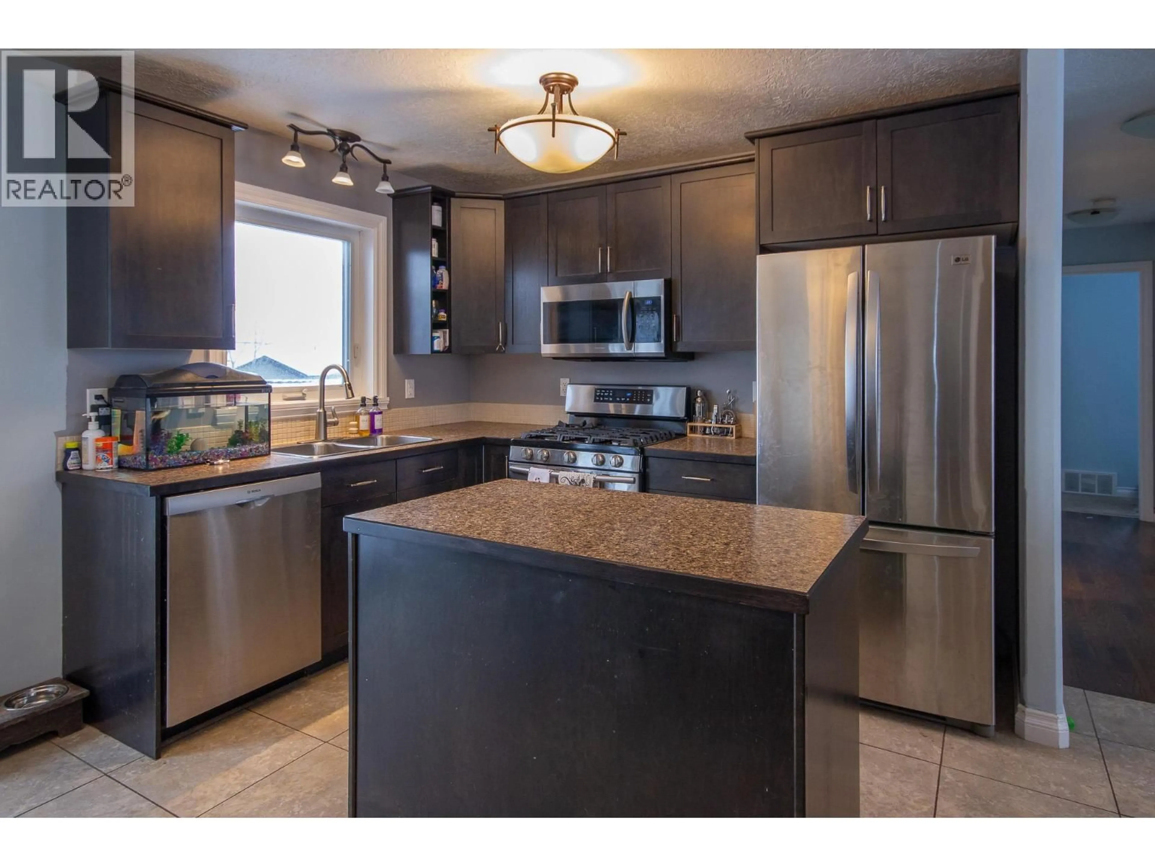 Open concept kitchen, unknown for 1717 87 AVENUE, Dawson Creek British Columbia V1G0B2