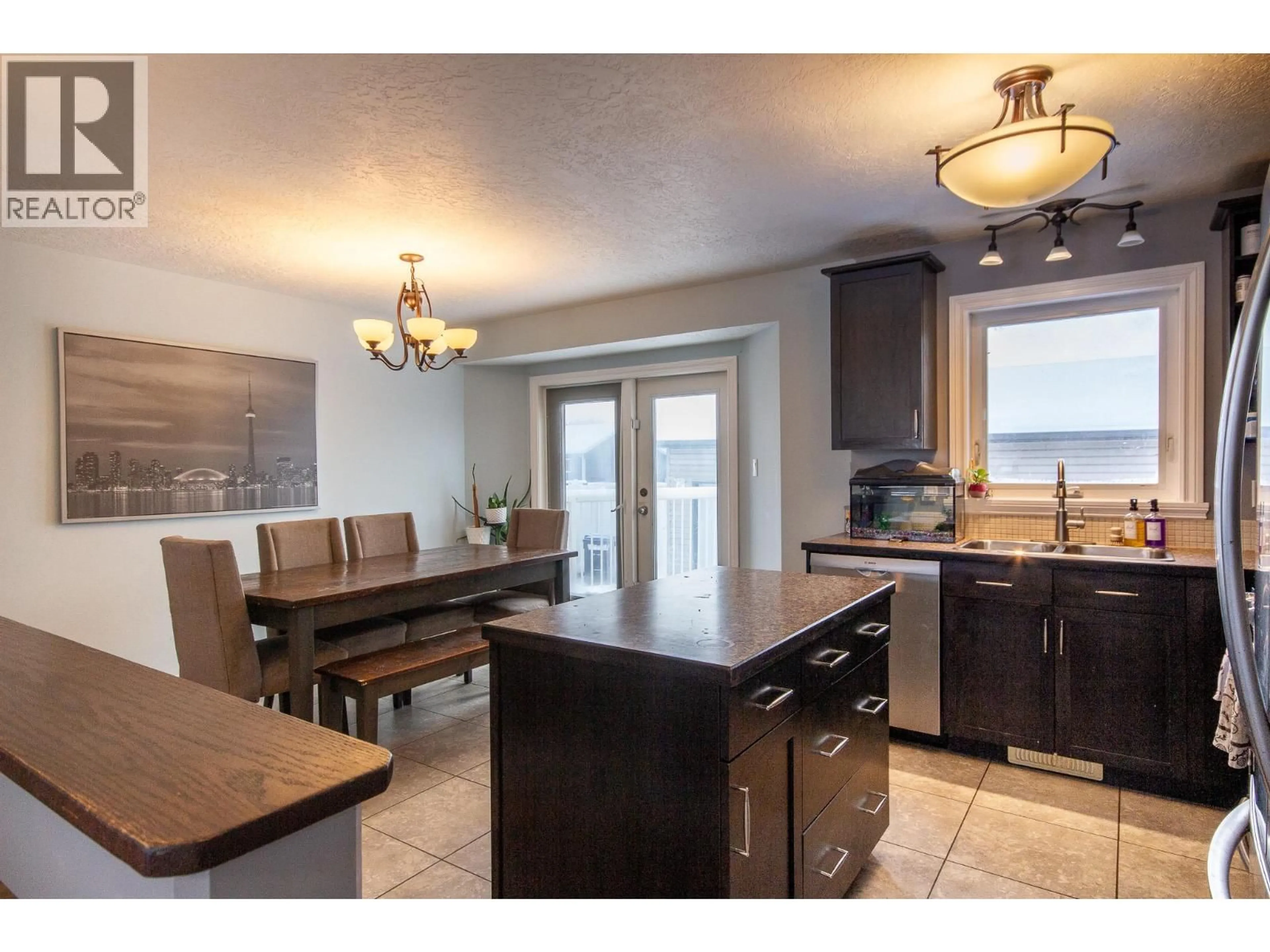 Open concept kitchen, unknown for 1717 87 AVENUE, Dawson Creek British Columbia V1G0B2