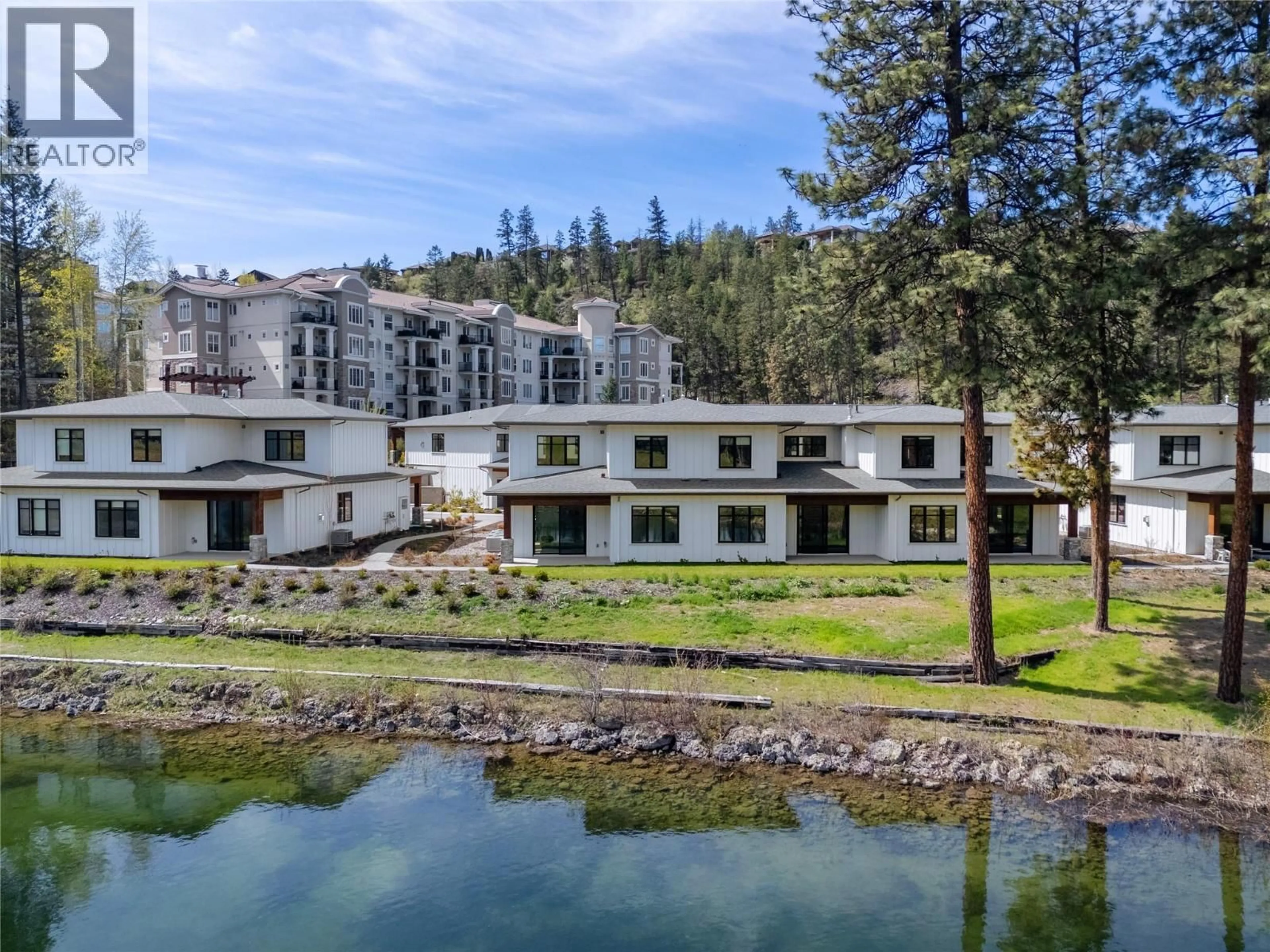 A pic from outside/outdoor area/front of a property/back of a property/a pic from drone, water/lake/river/ocean view for 7 - 1979 COUNTRY CLUB DRIVE, Kelowna British Columbia V1X0H6