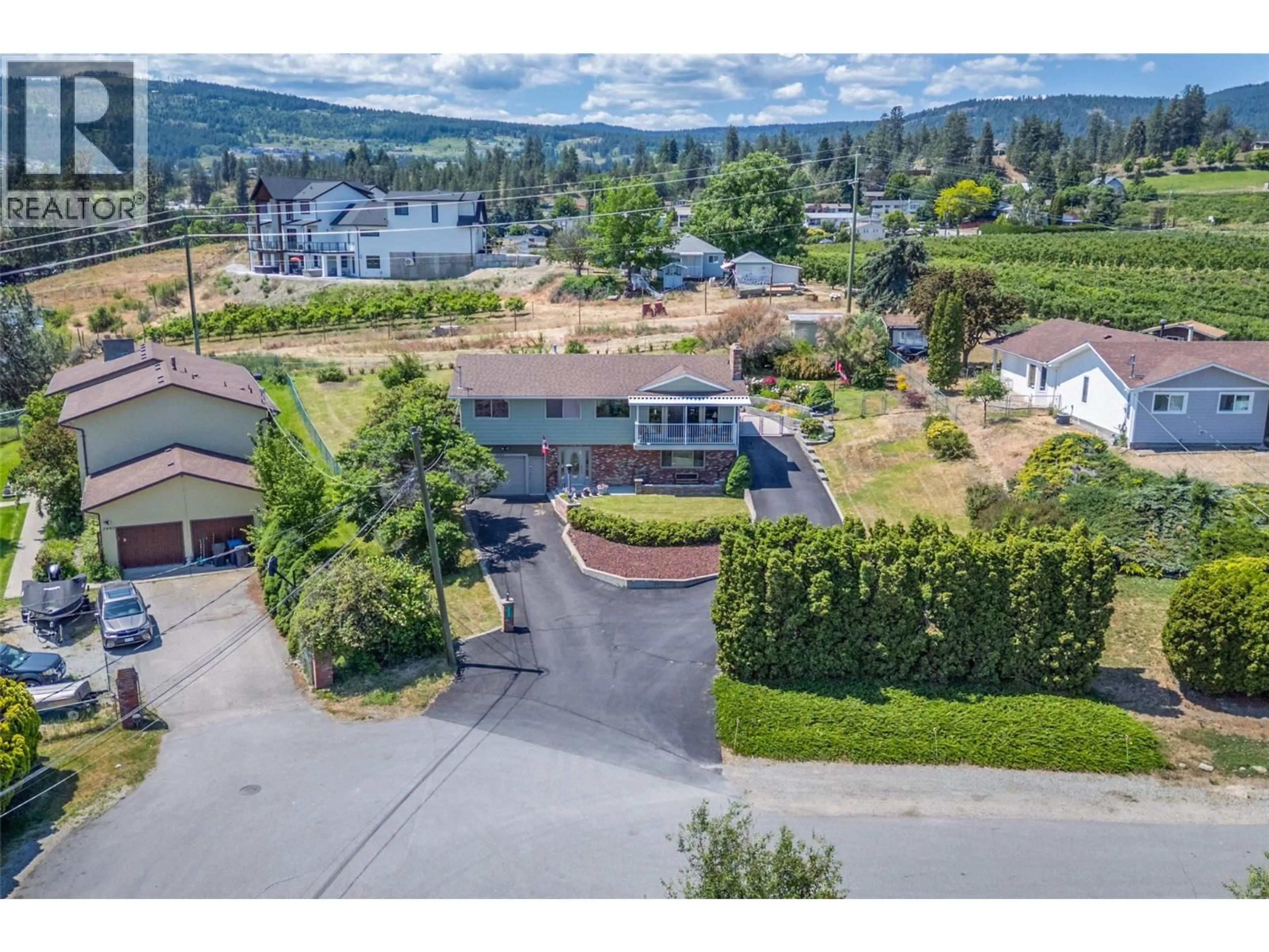 A pic from outside/outdoor area/front of a property/back of a property/a pic from drone, mountain view for 2489 CHIEFTAIN ROAD, West Kelowna British Columbia V4T1N3