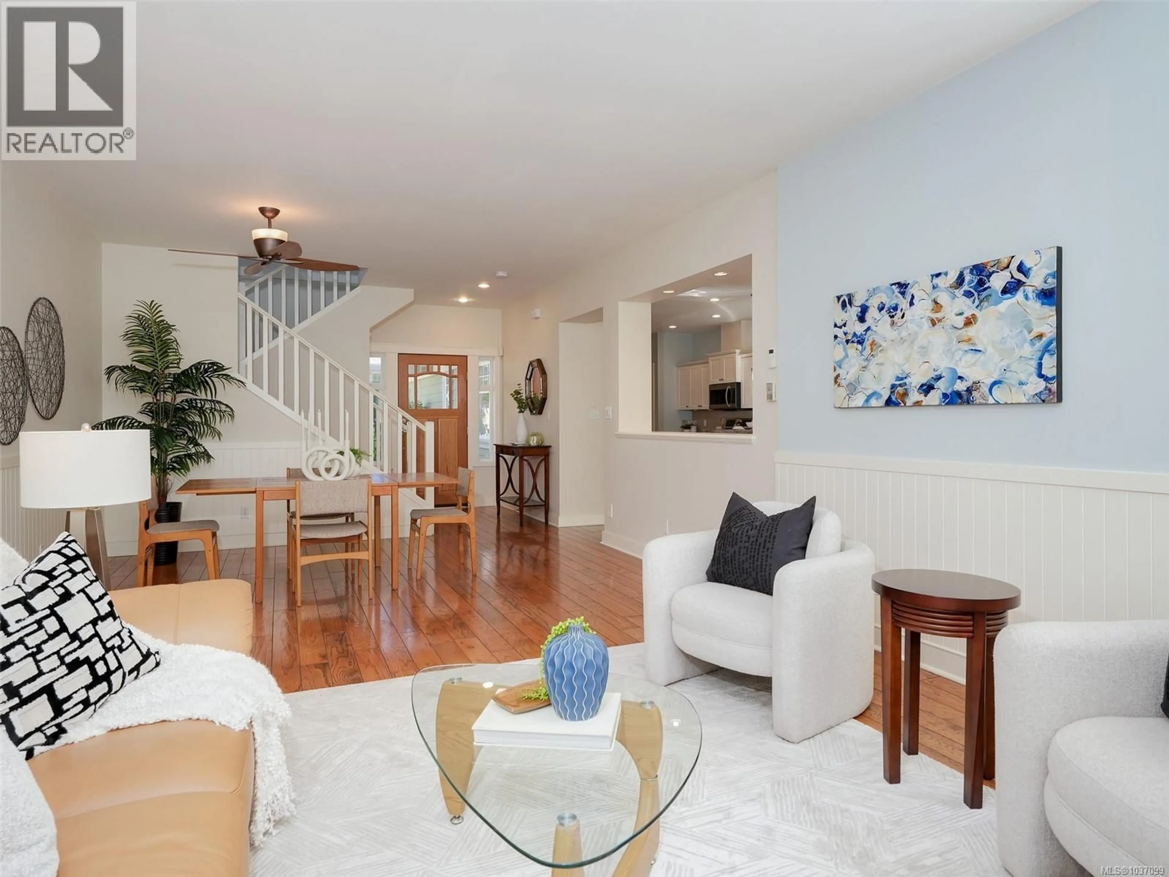 Living room with furniture, wood/laminate floor for 566 CASELTON PLACE, Saanich British Columbia V8Z7Y5