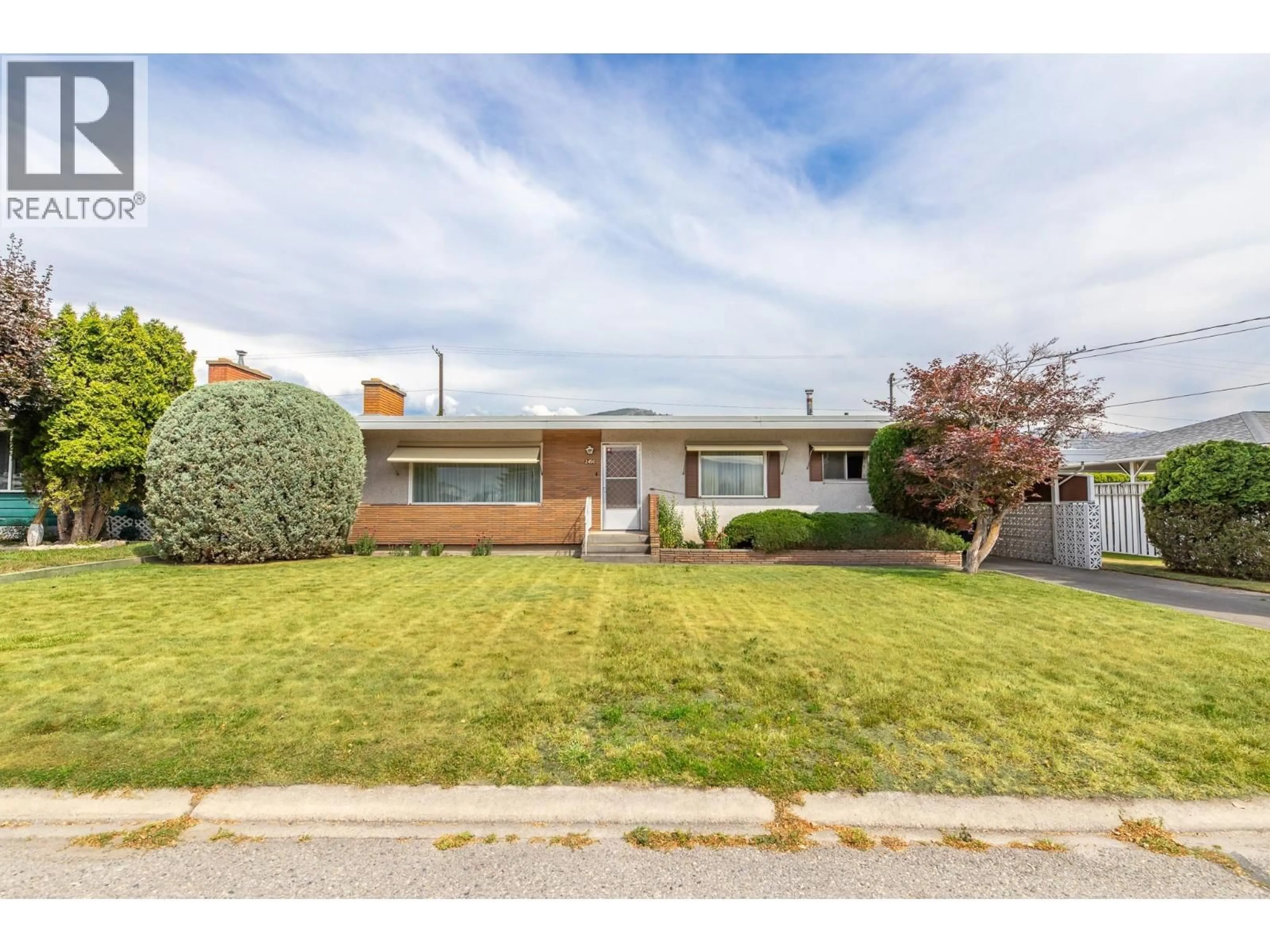 Home with brick exterior material, street for 2450 MCKENZIE STREET, Penticton British Columbia V2A6H7