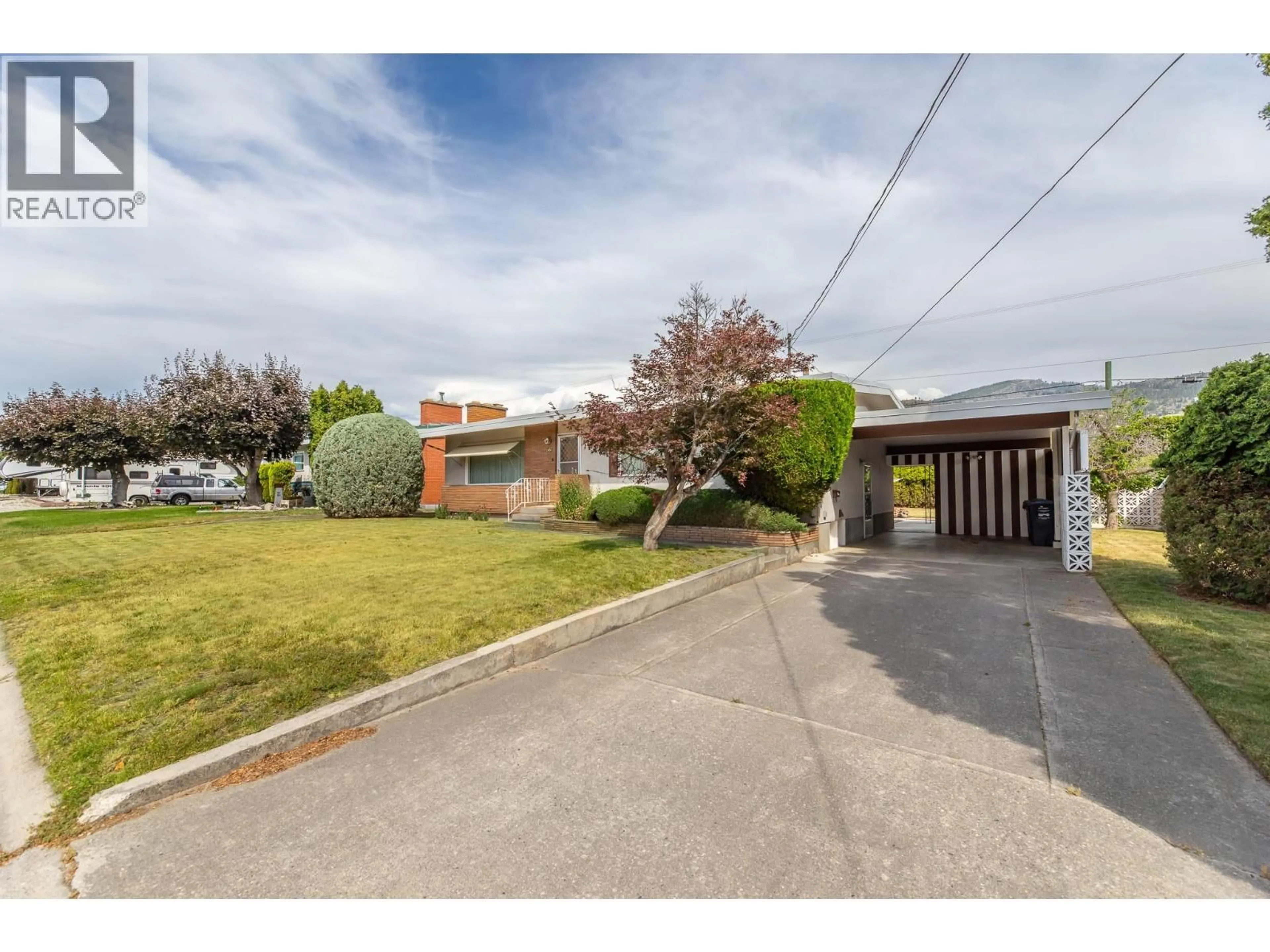 A pic from outside/outdoor area/front of a property/back of a property/a pic from drone, street for 2450 MCKENZIE STREET, Penticton British Columbia V2A6H7