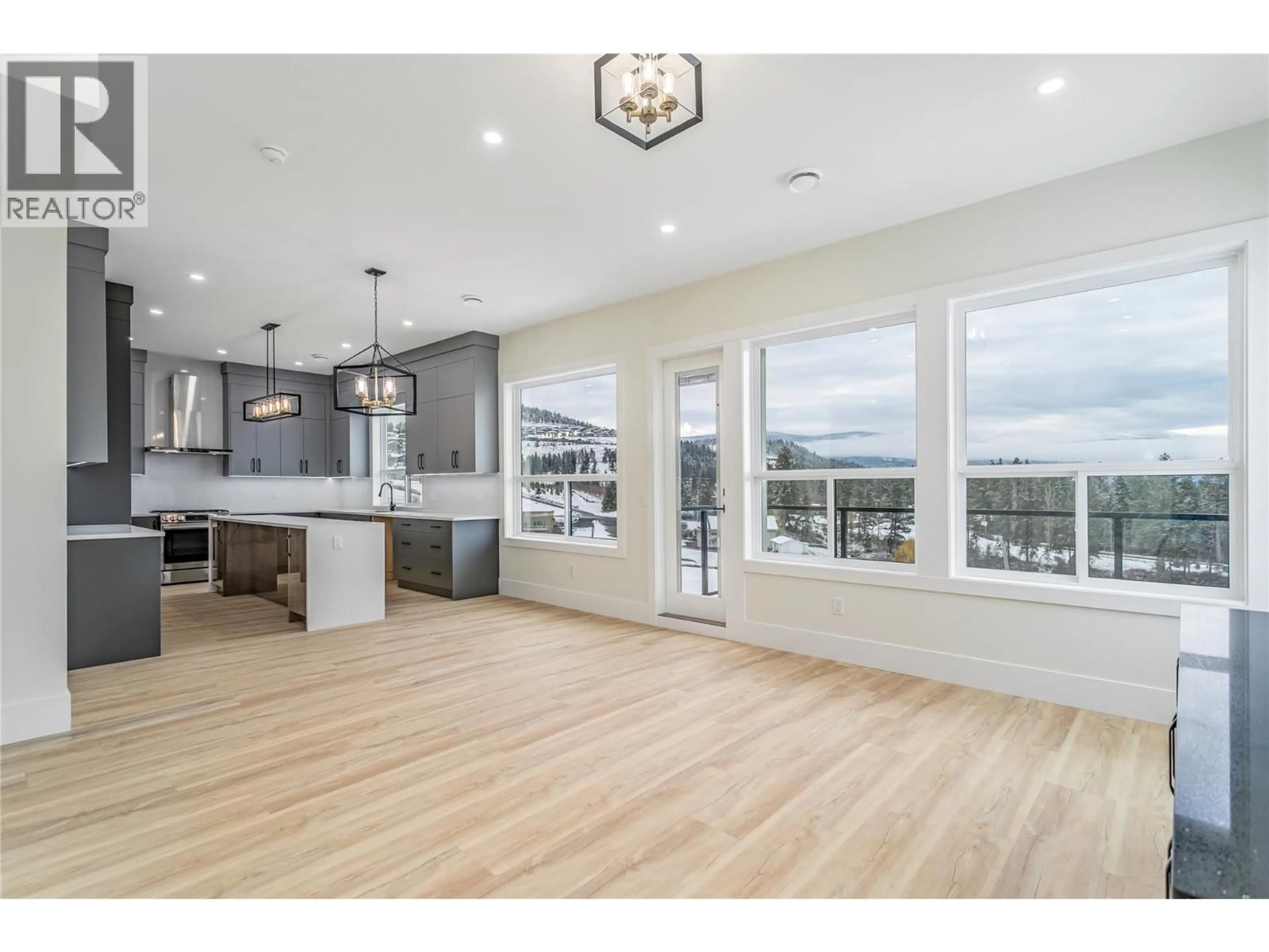 Open concept kitchen, wood/laminate floor for 1136 HUME AVENUE, Kelowna British Columbia V1P1S3