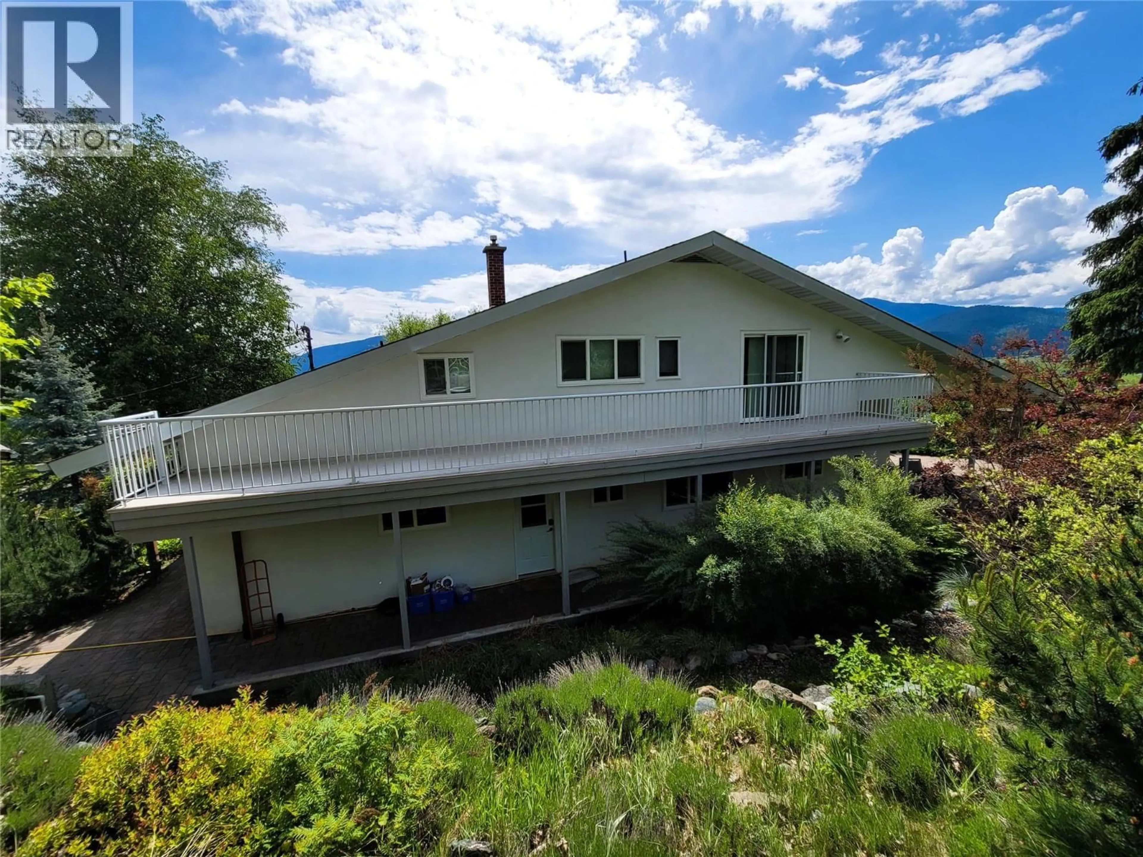 A pic from outside/outdoor area/front of a property/back of a property/a pic from drone, mountain view for 5855 SPENCER ROAD, Grand Forks British Columbia V0H1H5