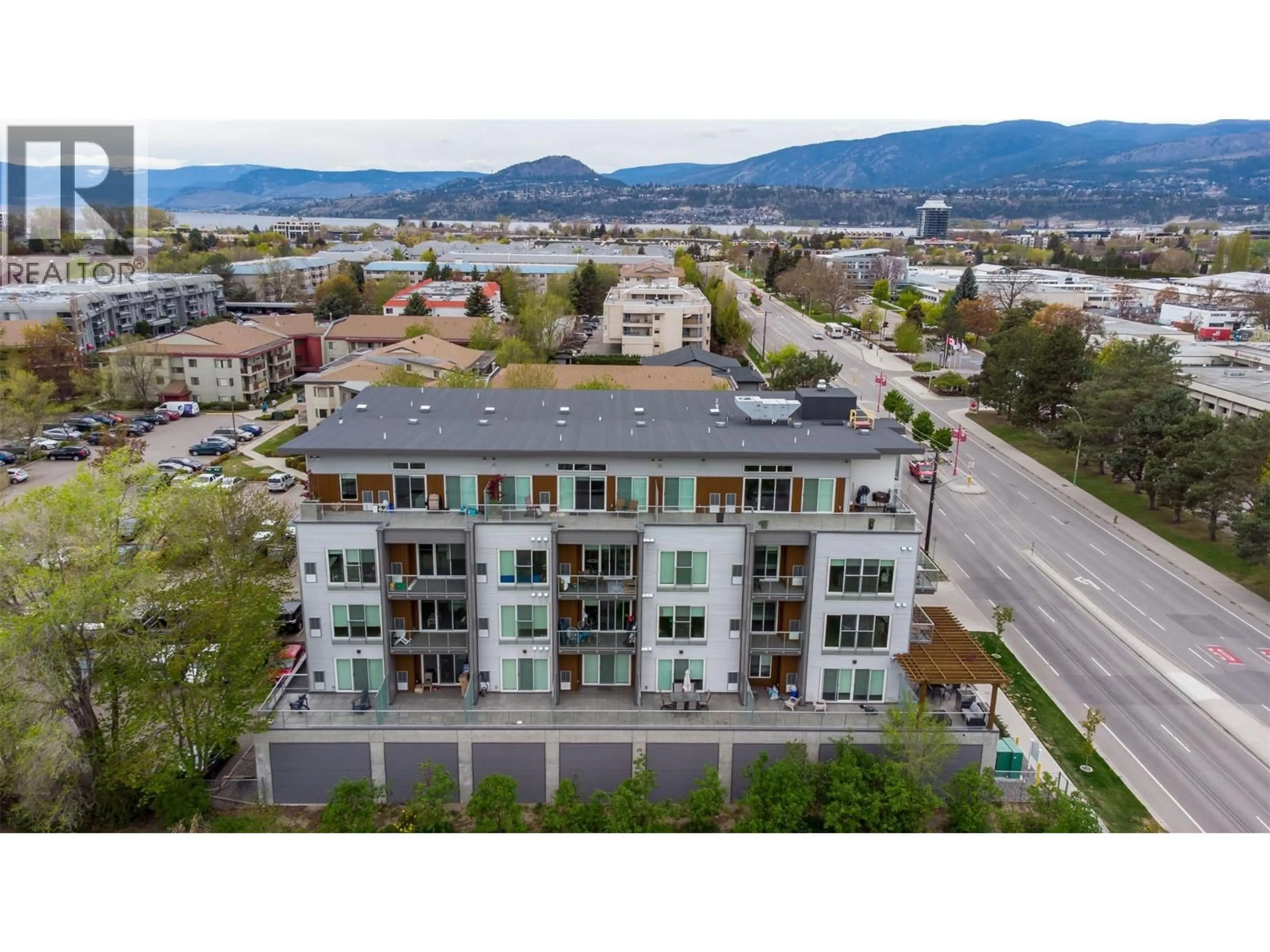 A pic from outside/outdoor area/front of a property/back of a property/a pic from drone, mountain view for 505 - 1083 KLO ROAD, Kelowna British Columbia V1Y4X6