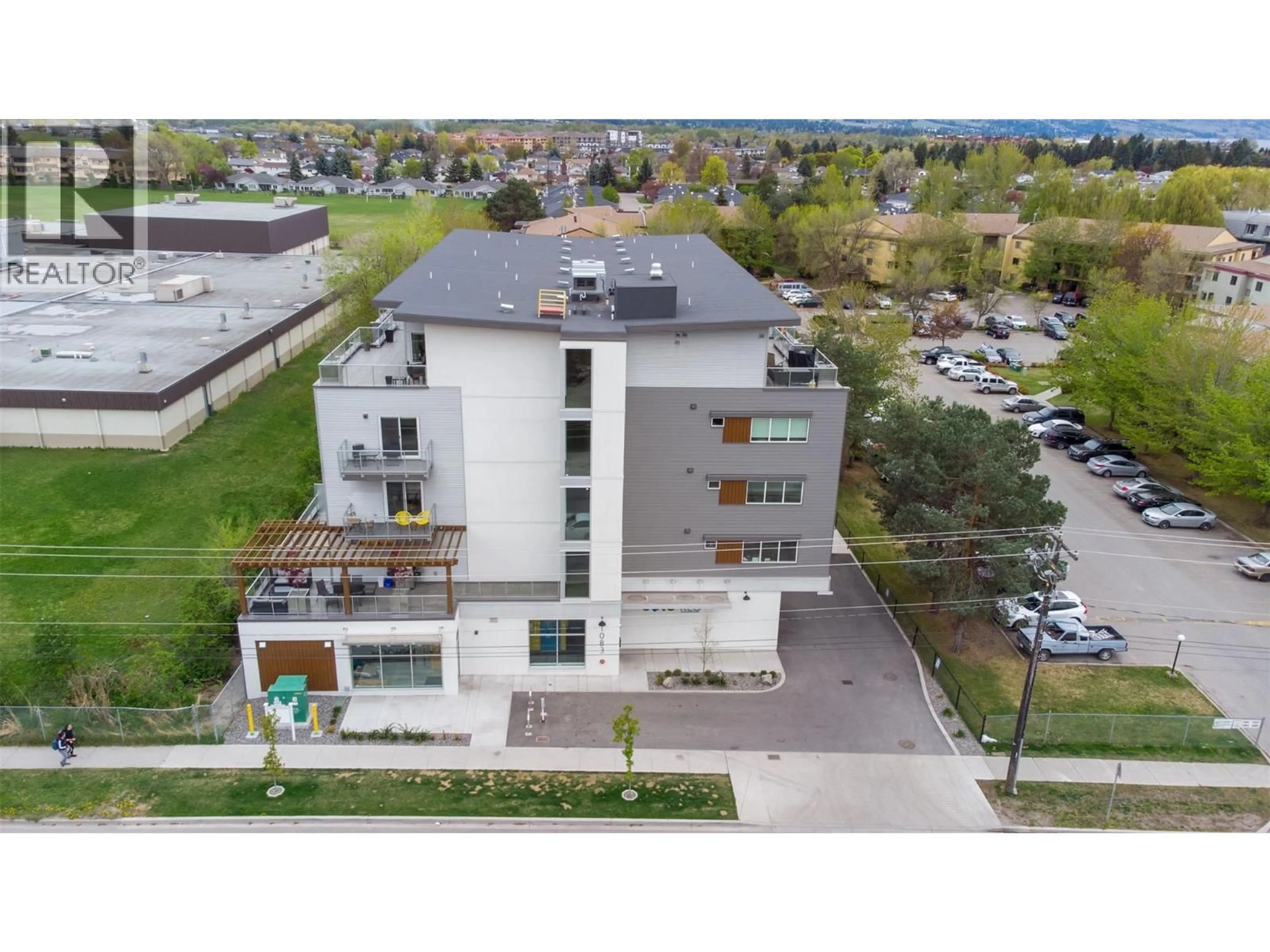 A pic from outside/outdoor area/front of a property/back of a property/a pic from drone, building for 505 - 1083 KLO ROAD, Kelowna British Columbia V1Y4X6