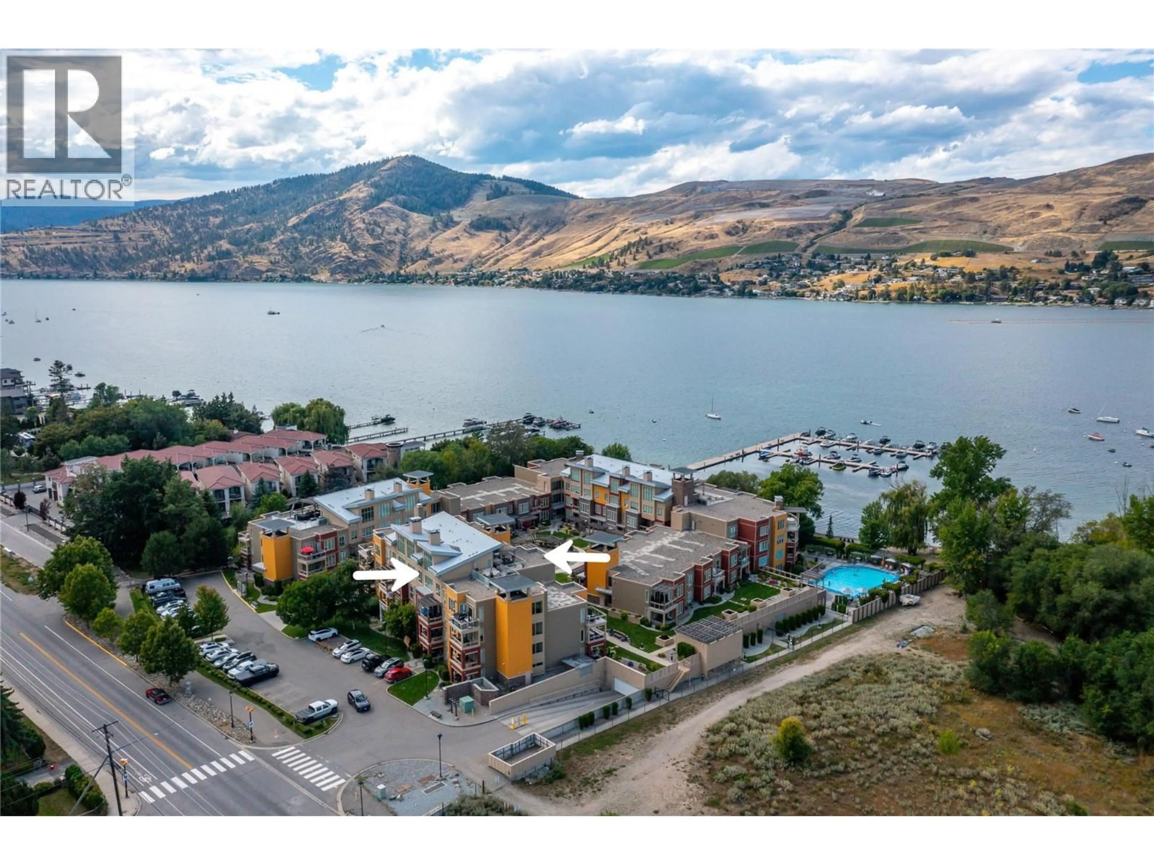 A pic from outside/outdoor area/front of a property/back of a property/a pic from drone, water/lake/river/ocean view for 2405 - 7343 OKANAGAN LANDING ROAD, Vernon British Columbia V1H2J6