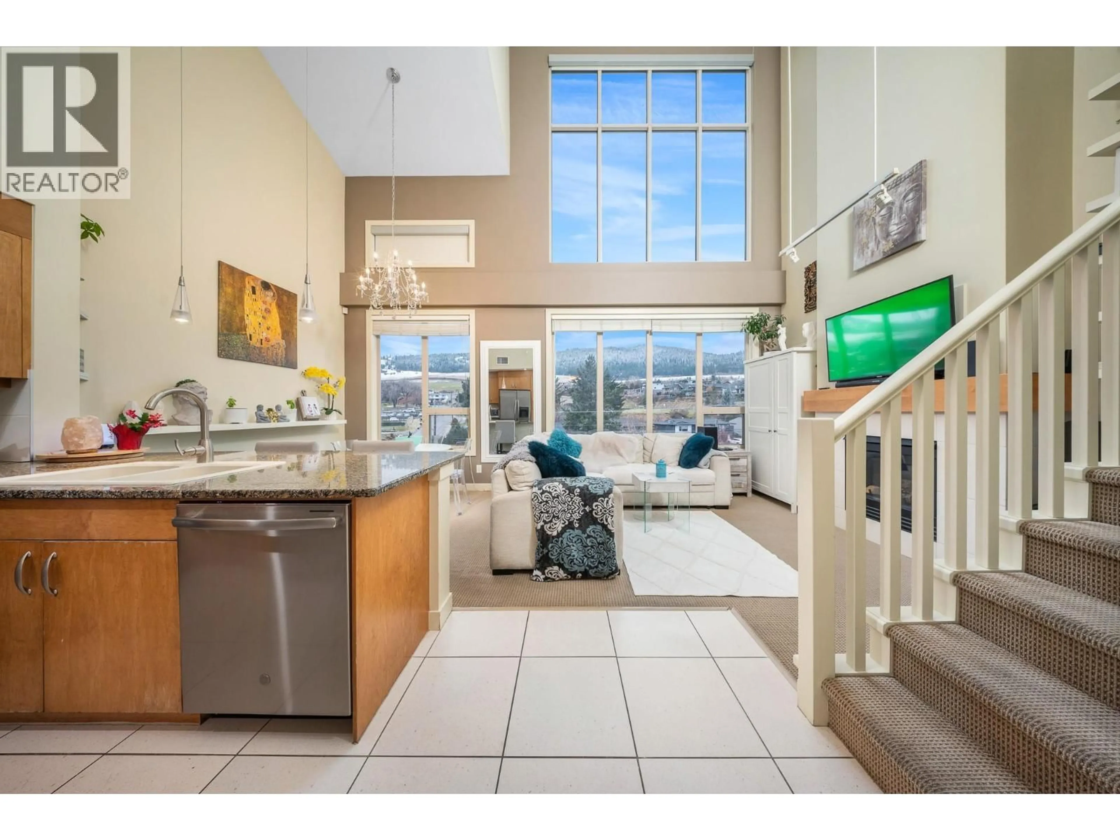 Open concept kitchen, ceramic/tile floor for 2405 - 7343 OKANAGAN LANDING ROAD, Vernon British Columbia V1H2J6