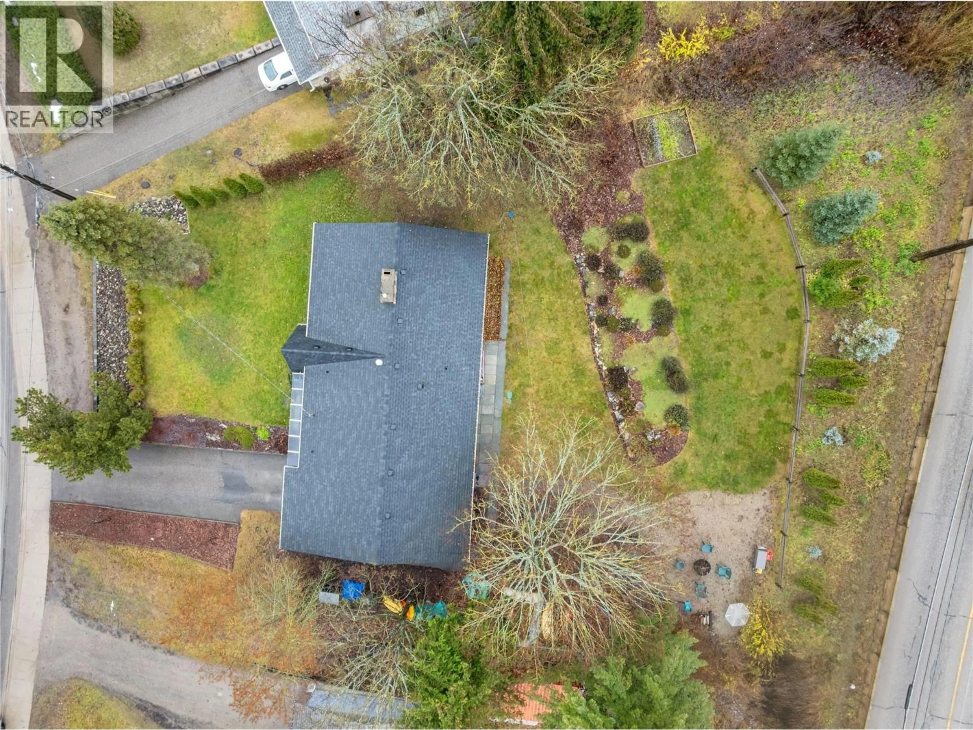 A pic from outside/outdoor area/front of a property/back of a property/a pic from drone, street for 2150 1 AVENUE NORTHEAST, Salmon Arm British Columbia V1E1Z4