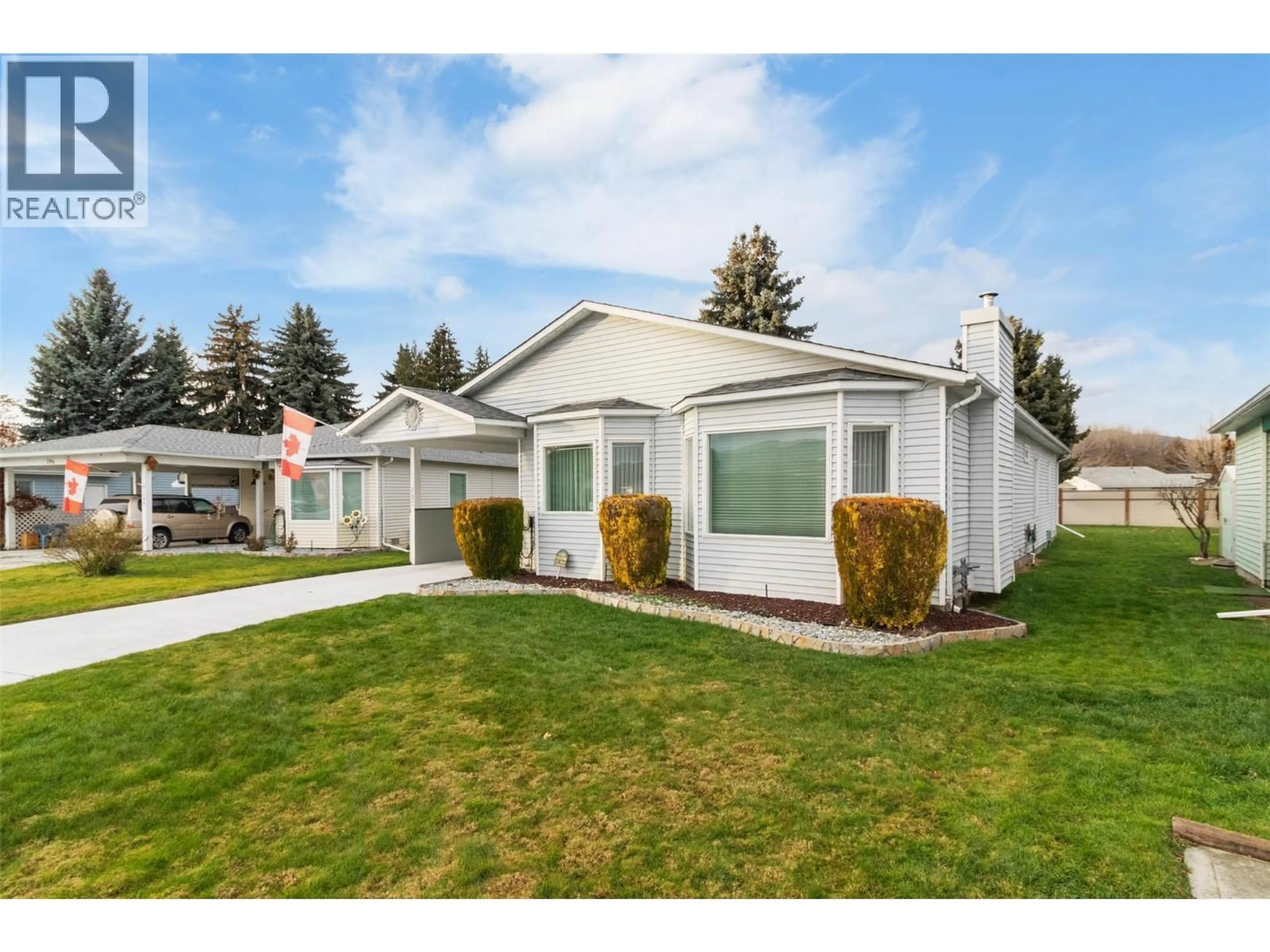 Home with vinyl exterior material, street for 197 - 1255 RAYMER AVENUE, Kelowna British Columbia V1W3S3