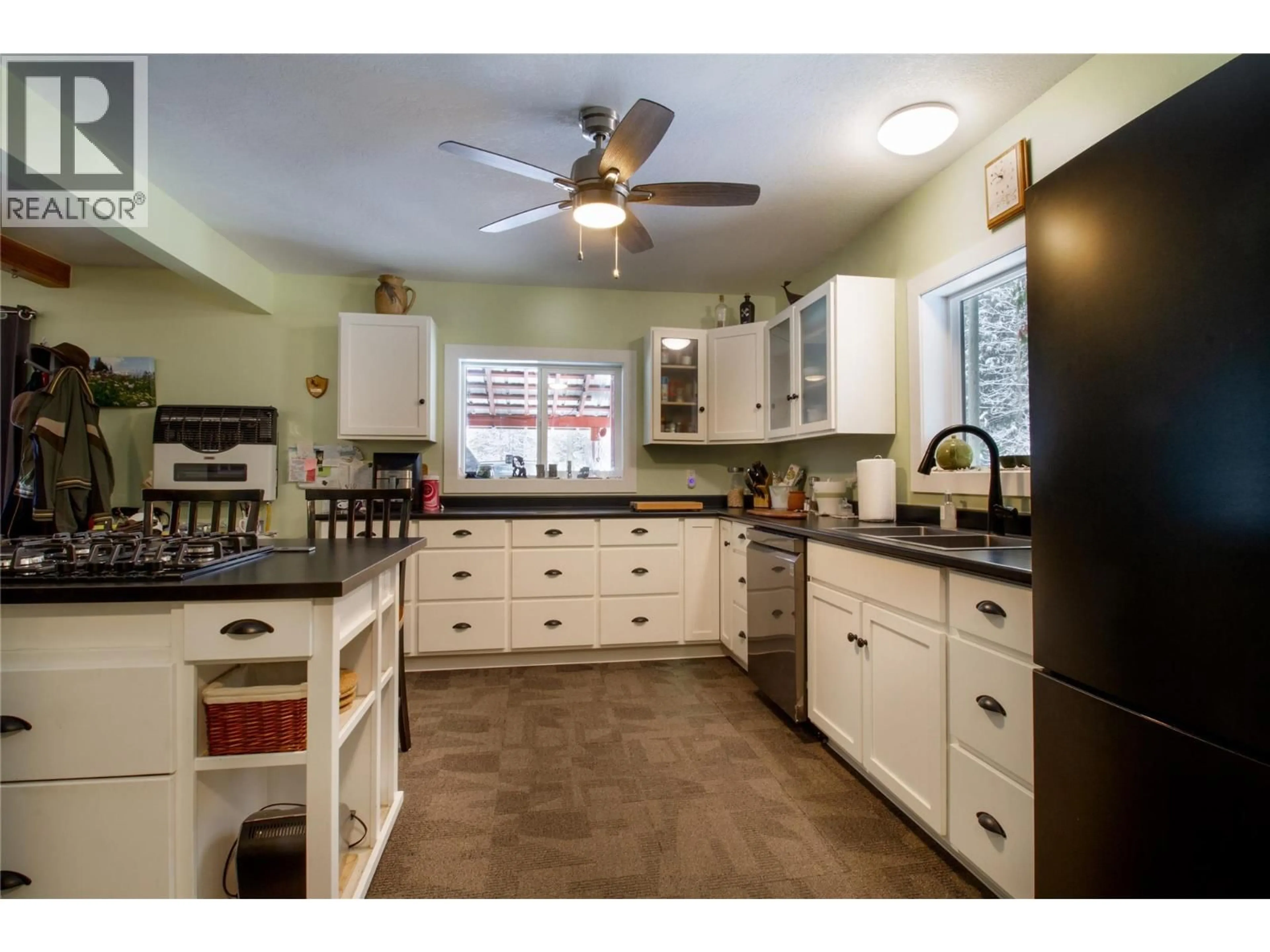 Open concept kitchen, ceramic/tile floor for 475 WESTSIDE ROAD, Trout Lake British Columbia V0G1R2