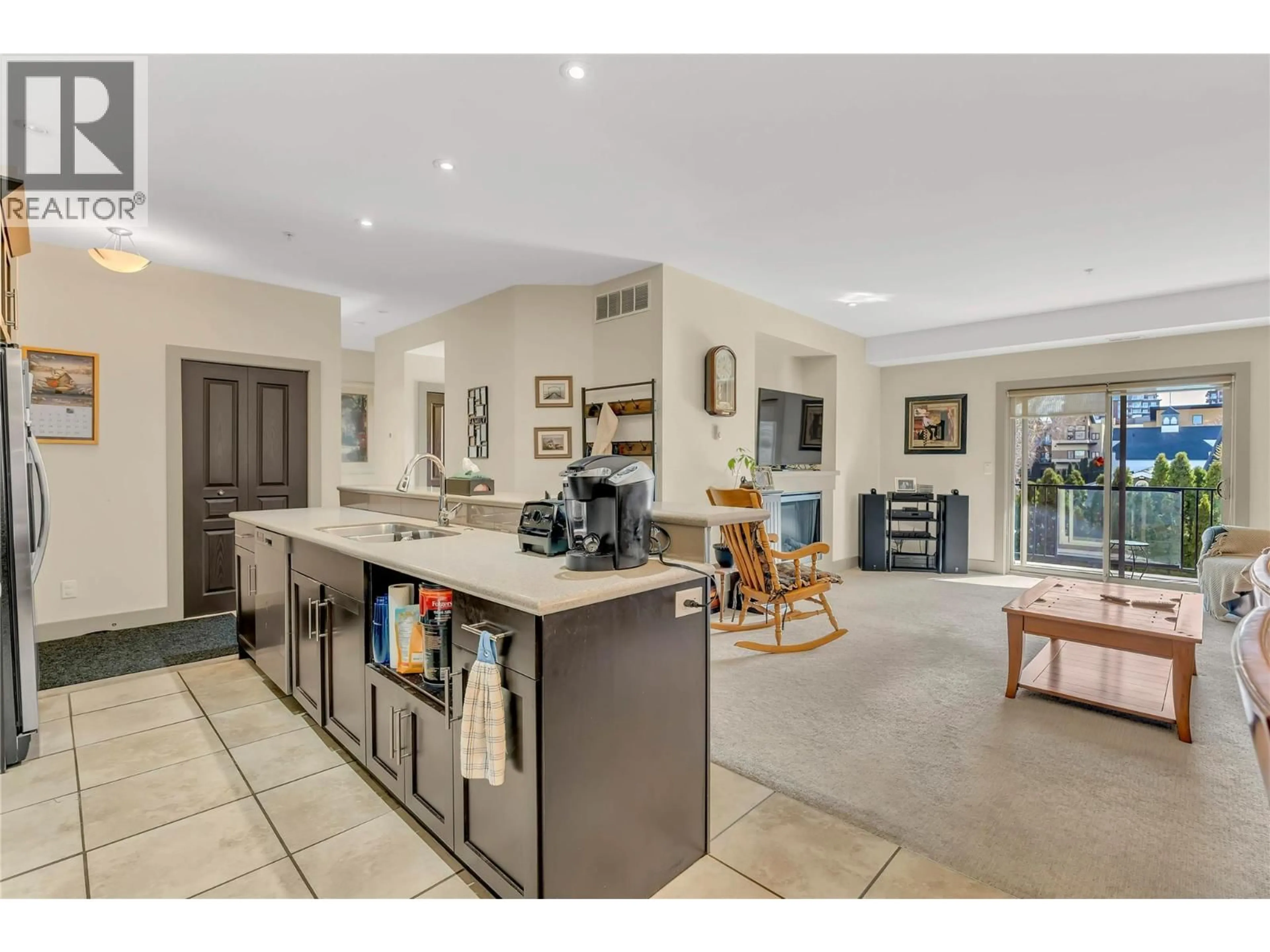 Open concept kitchen, ceramic/tile floor for 208 - 250 WATERFORD AVENUE, Penticton British Columbia V2A3T8