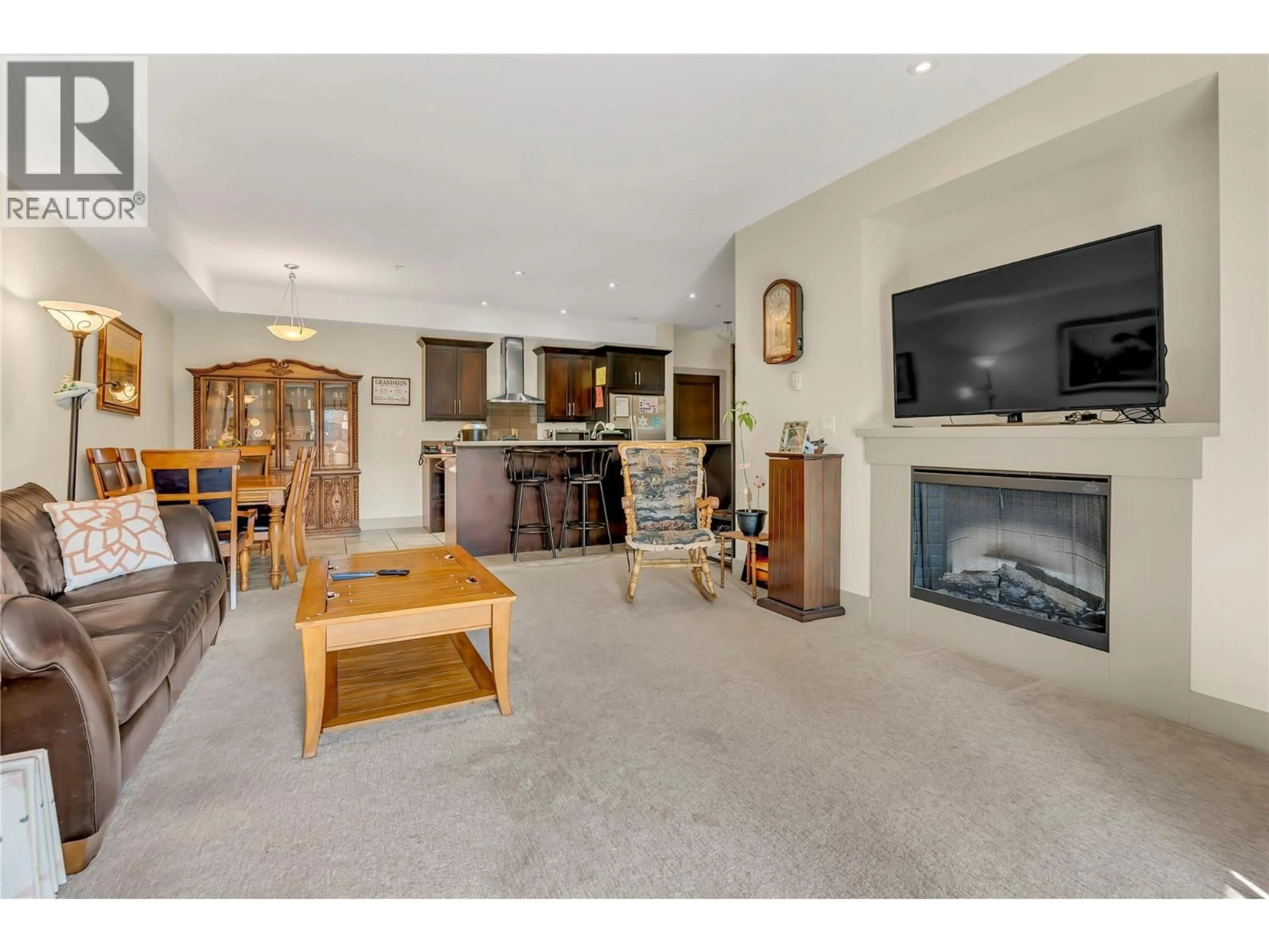 Living room with furniture, unknown for 208 - 250 WATERFORD AVENUE, Penticton British Columbia V2A3T8