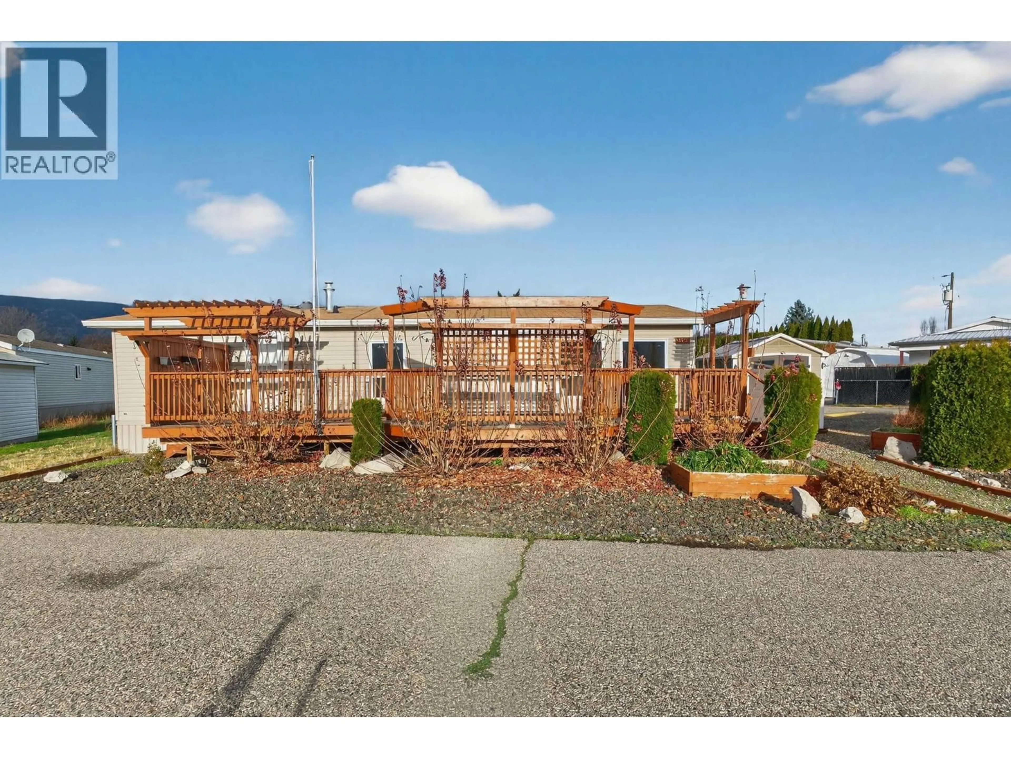 A pic from outside/outdoor area/front of a property/back of a property/a pic from drone, building for 125 - 2035 BOUCHERIE ROAD, Westbank British Columbia V4T2T9