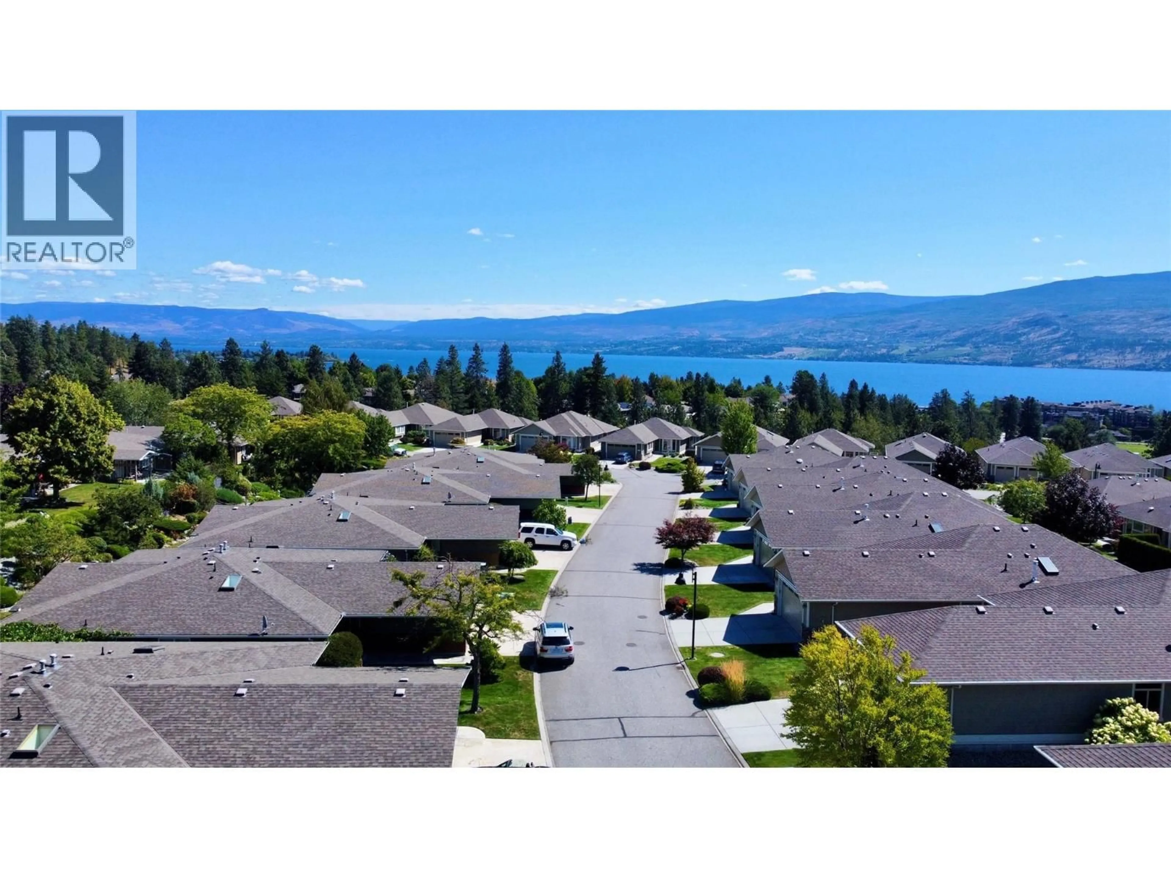 A pic from outside/outdoor area/front of a property/back of a property/a pic from drone, water/lake/river/ocean view for 125 - 4035 GELLATLY ROAD SOUTH, West Kelowna British Columbia V4T1R7