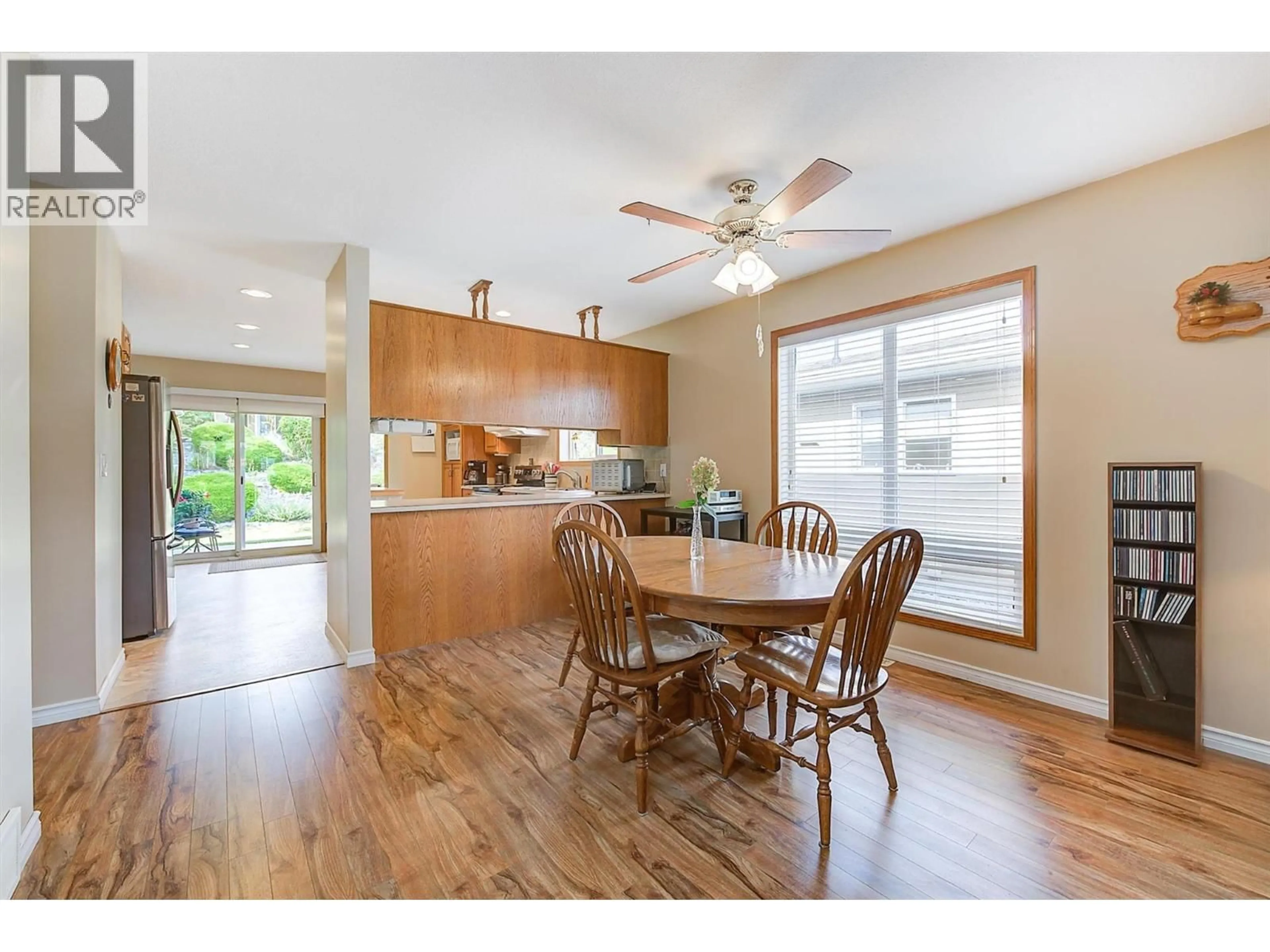 Open concept kitchen, wood/laminate floor for 125 - 4035 GELLATLY ROAD SOUTH, West Kelowna British Columbia V4T1R7