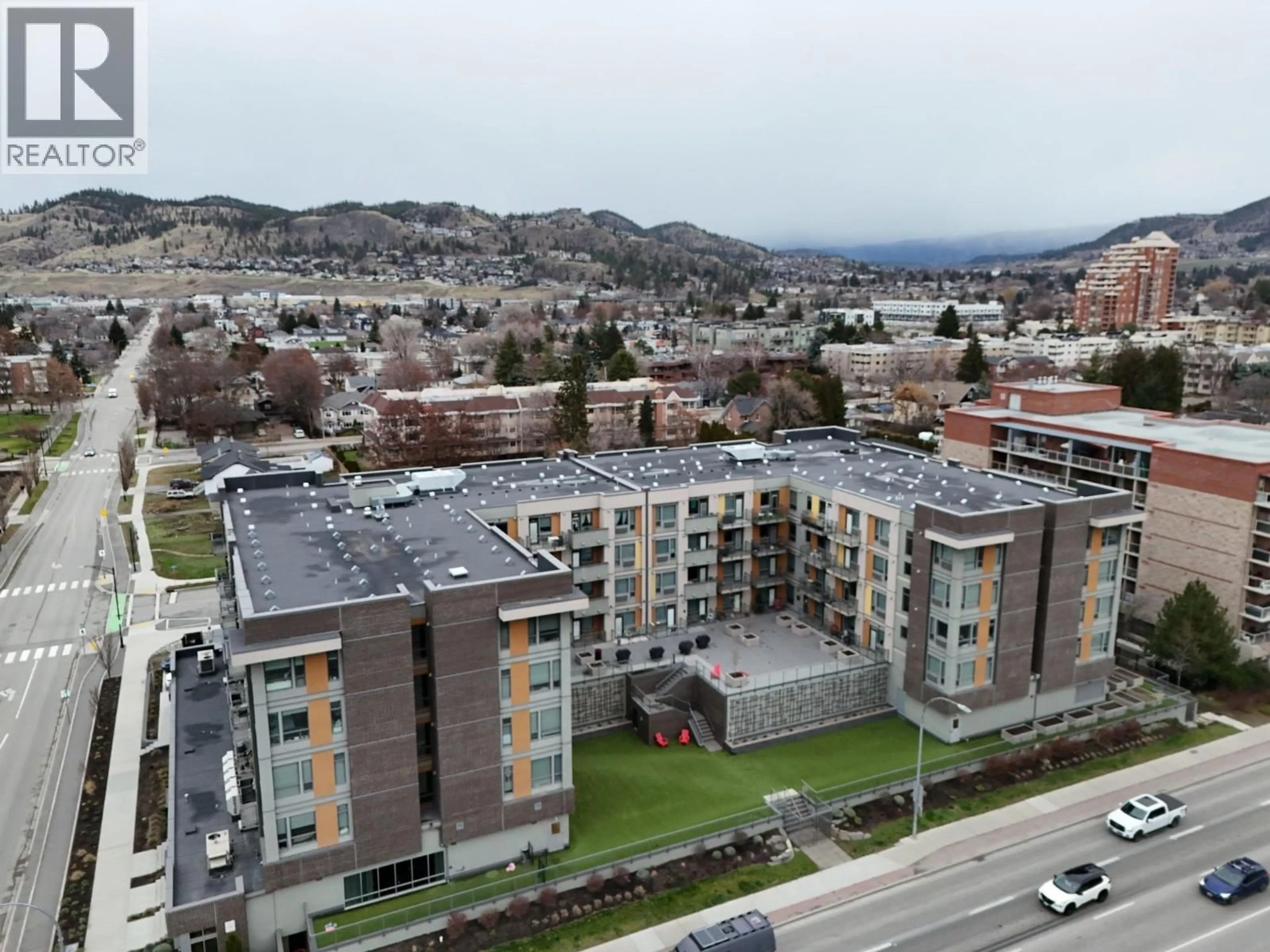 A pic from outside/outdoor area/front of a property/back of a property/a pic from drone, city buildings view from balcony for 407 - 925 LEON AVENUE, Kelowna British Columbia V1Y0E5