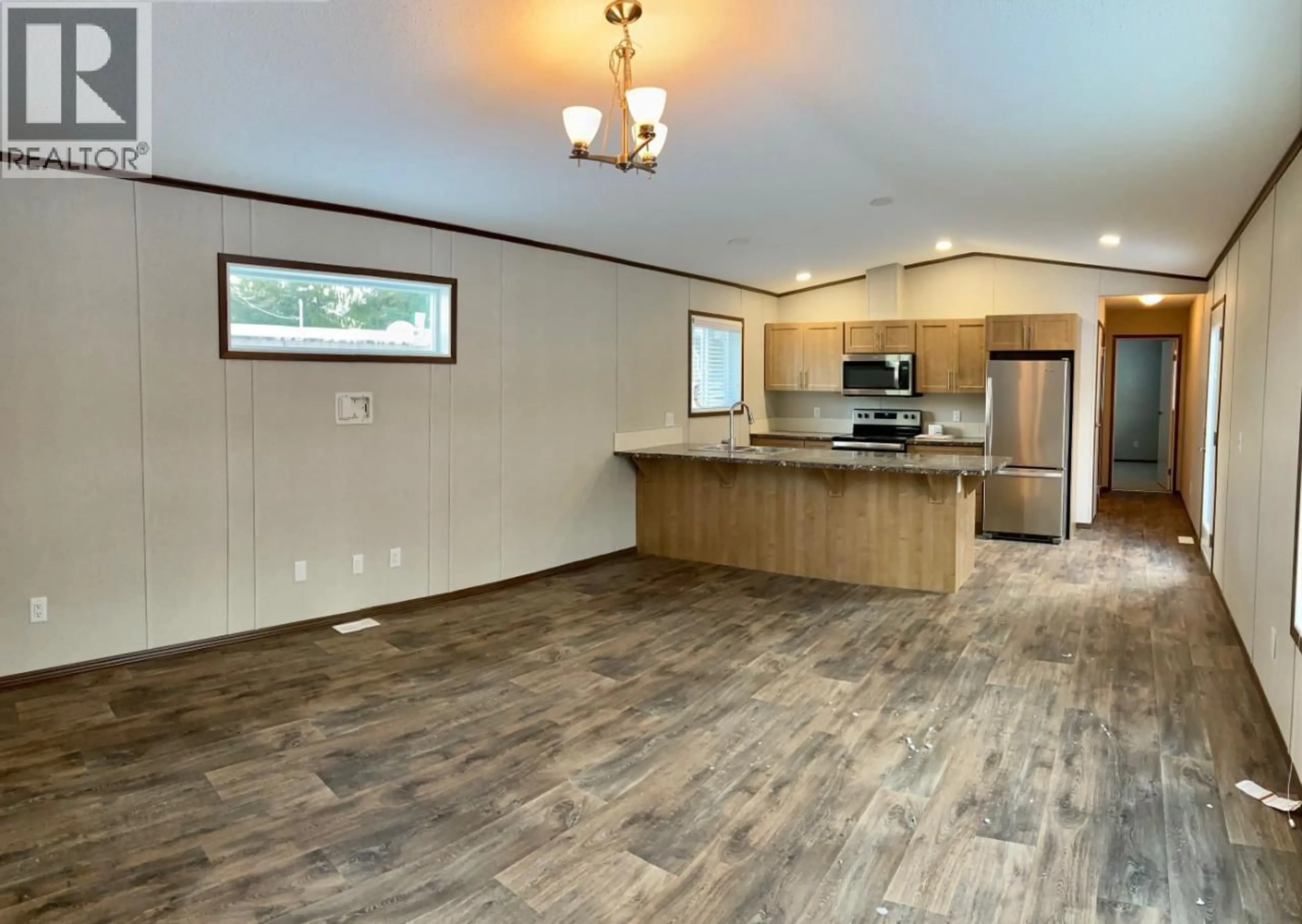 Open concept kitchen, wood/laminate floor for 8 - 891 MONTE VISTA DRIVE, Rossland British Columbia V0G1Y0
