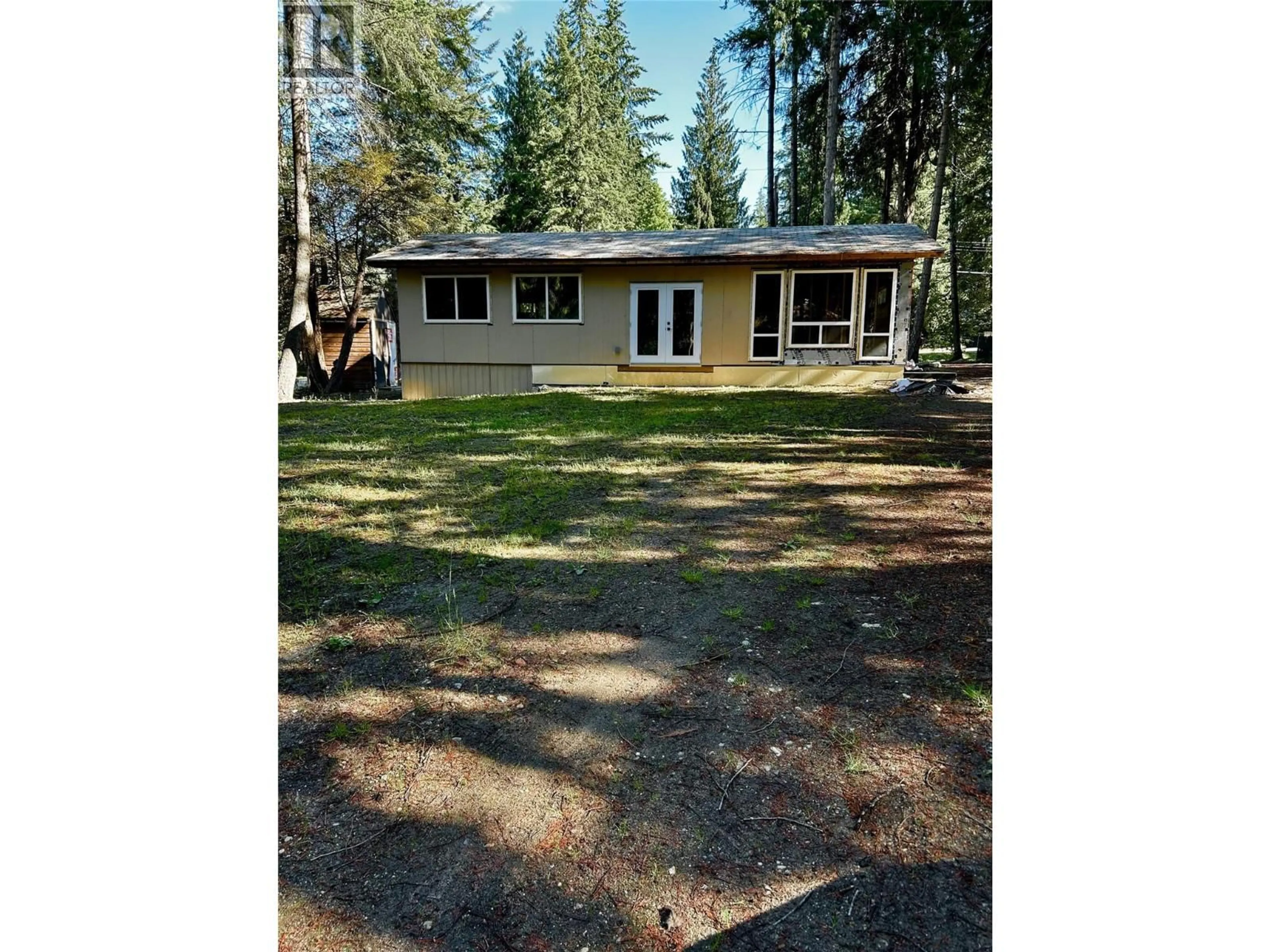 A pic from outside/outdoor area/front of a property/back of a property/a pic from drone, forest/trees view for 650 SWANSEA POINT ROAD, Swansea Point British Columbia V0E2K2