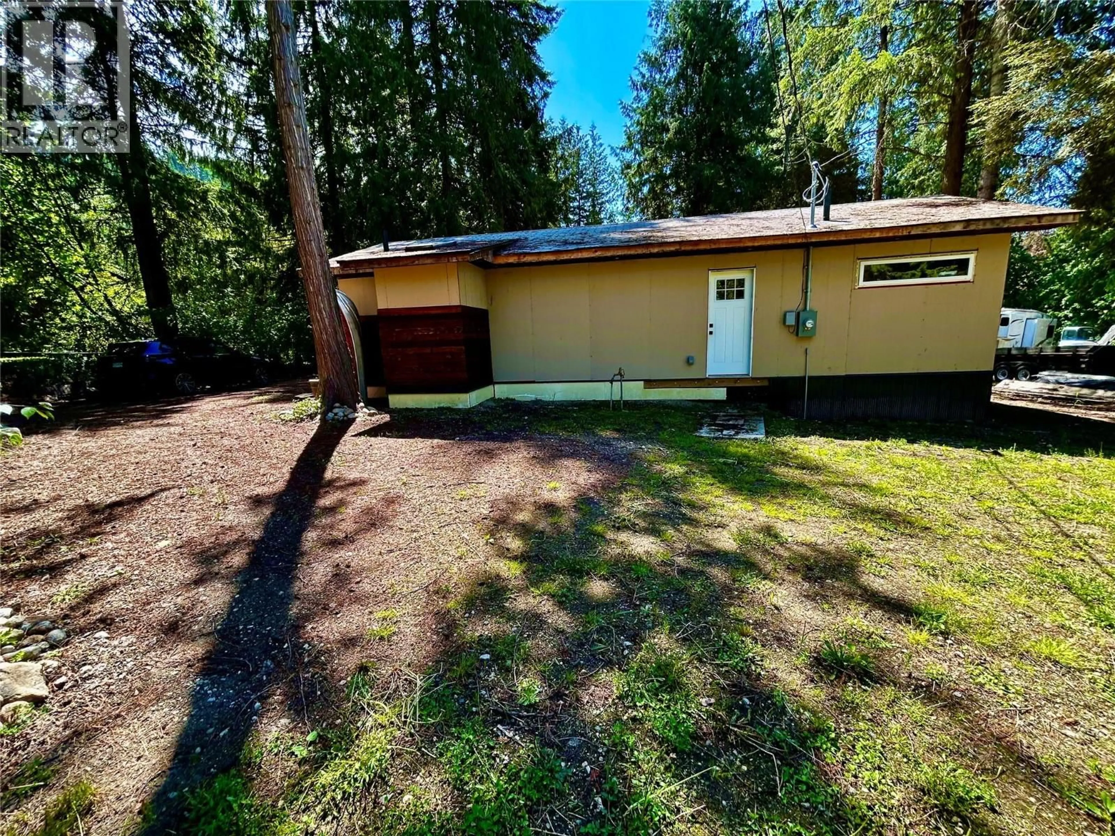 A pic from outside/outdoor area/front of a property/back of a property/a pic from drone, forest/trees view for 650 SWANSEA POINT ROAD, Swansea Point British Columbia V0E2K2