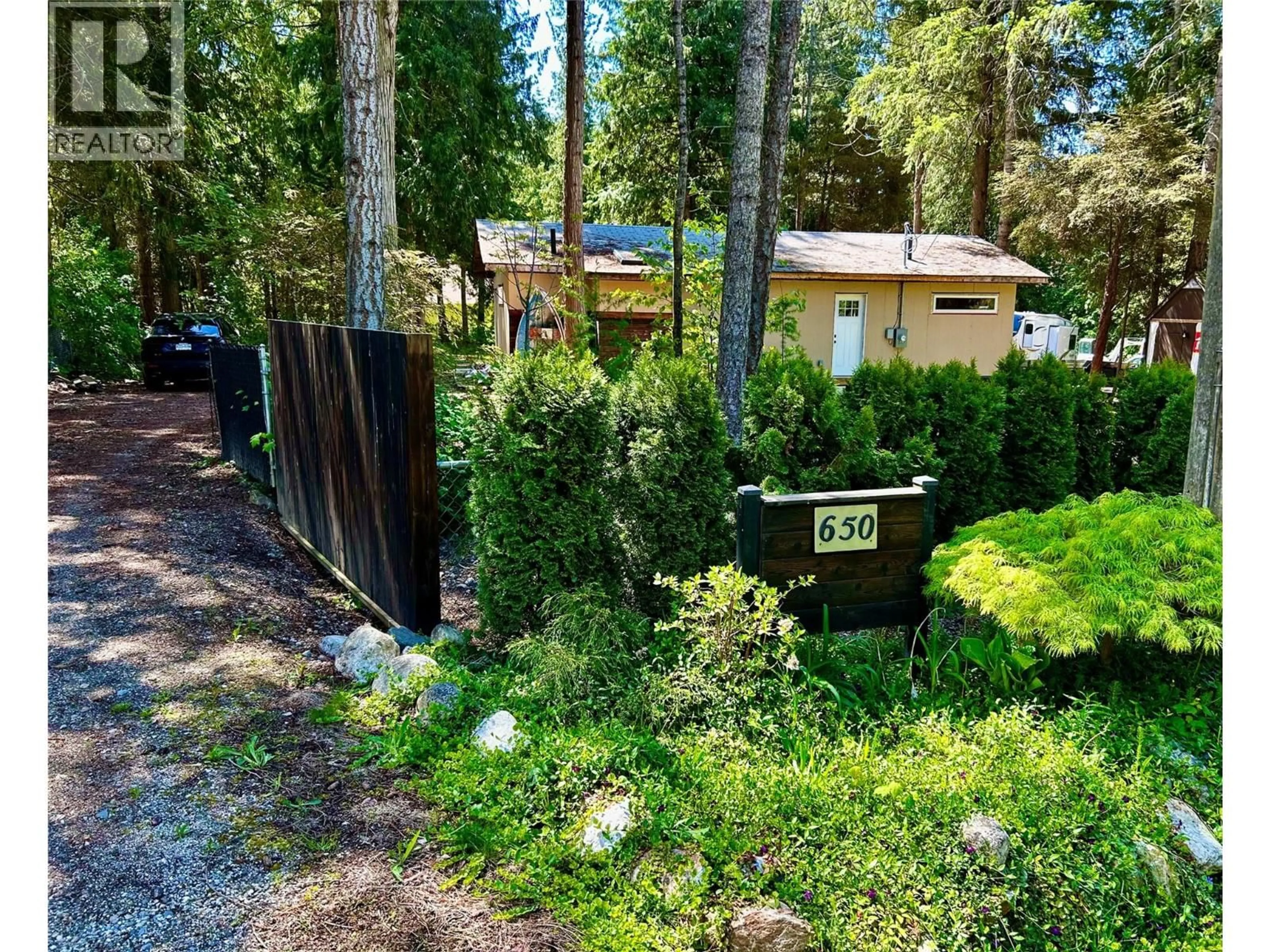 A pic from outside/outdoor area/front of a property/back of a property/a pic from drone, forest/trees view for 650 SWANSEA POINT ROAD, Swansea Point British Columbia V0E2K2