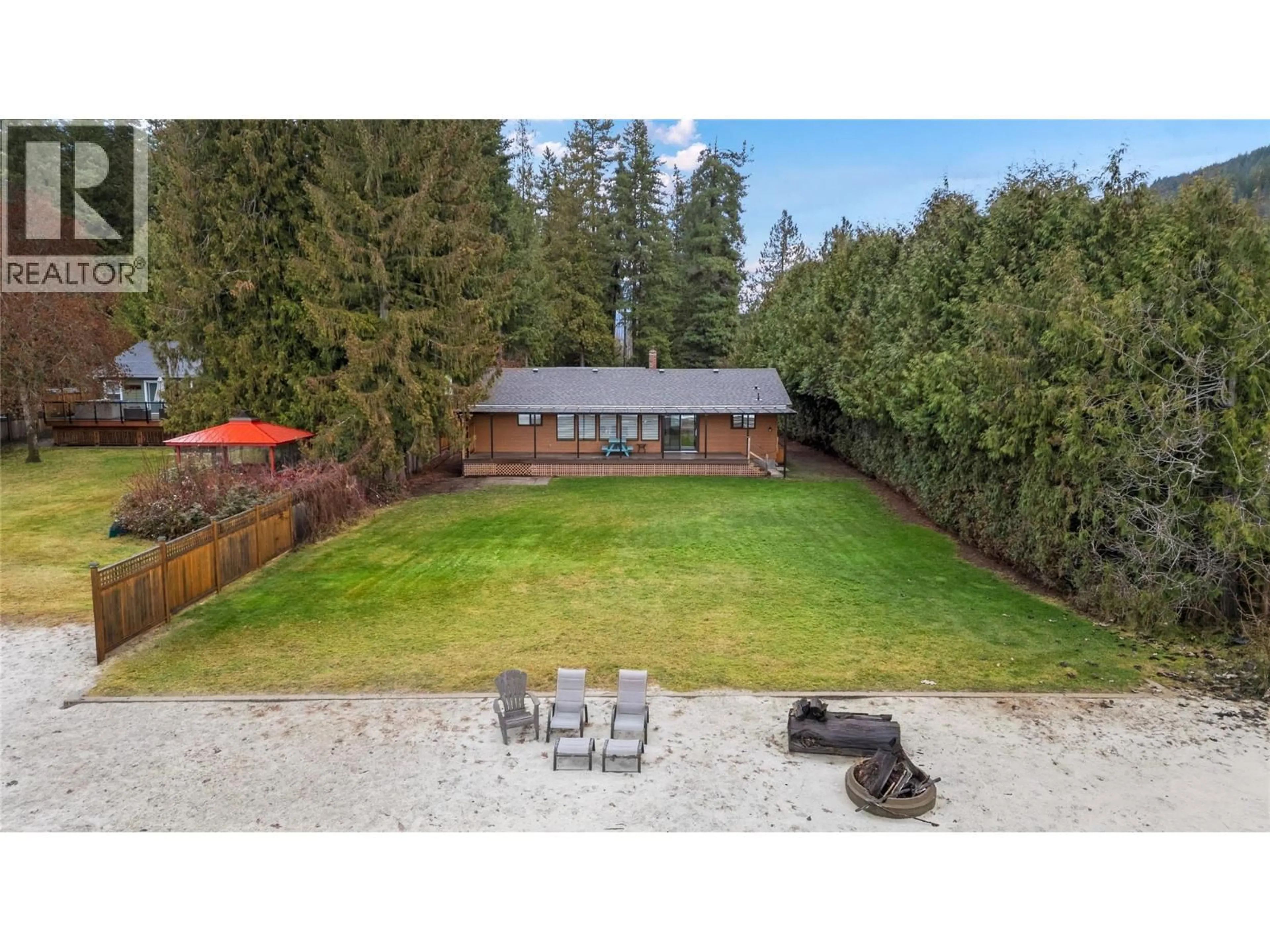 A pic from outside/outdoor area/front of a property/back of a property/a pic from drone, unknown for 401 97A HIGHWAY, Sicamous British Columbia V0E2V1