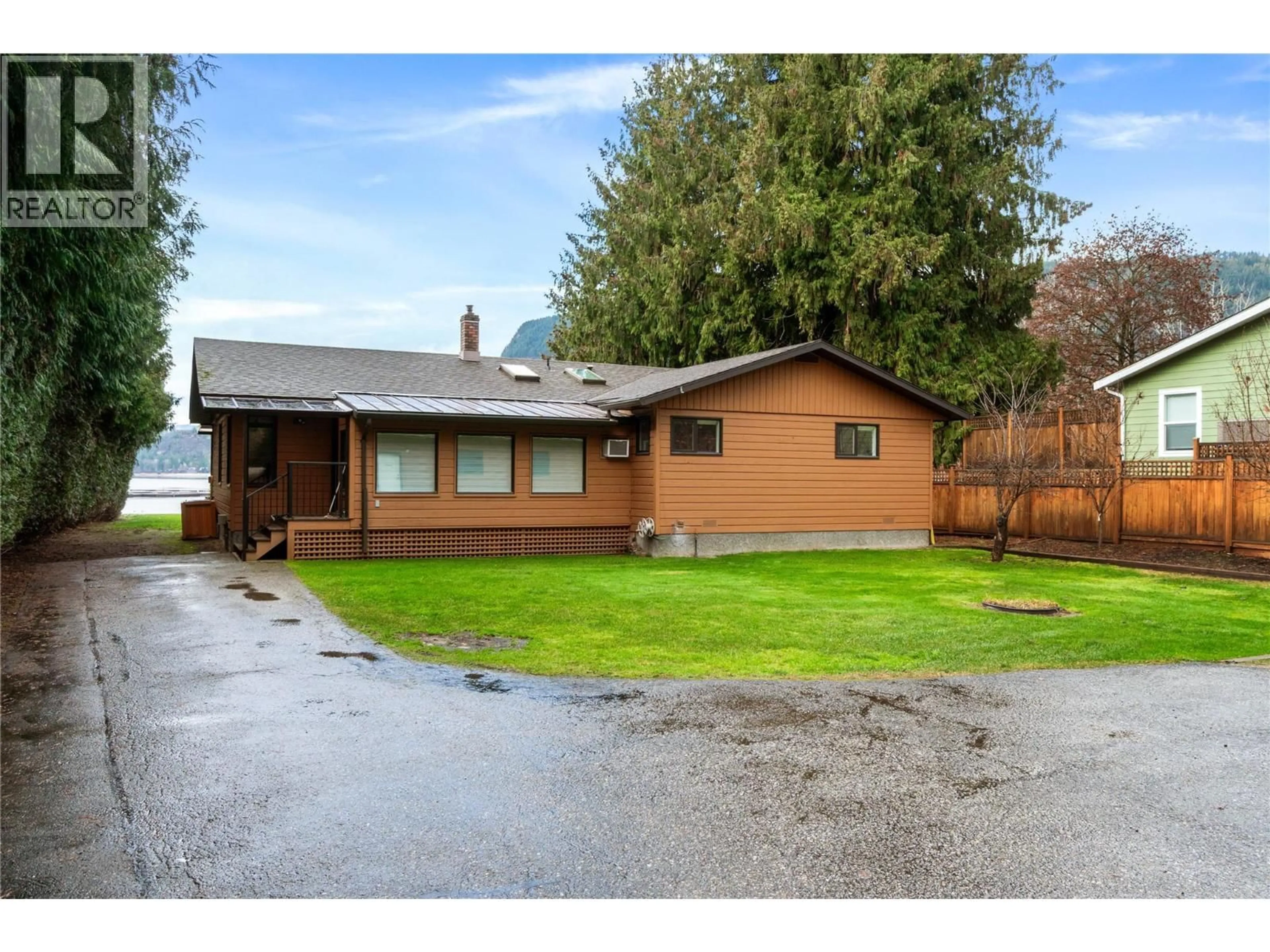 A pic from outside/outdoor area/front of a property/back of a property/a pic from drone, street for 401 97A HIGHWAY, Sicamous British Columbia V0E2V1