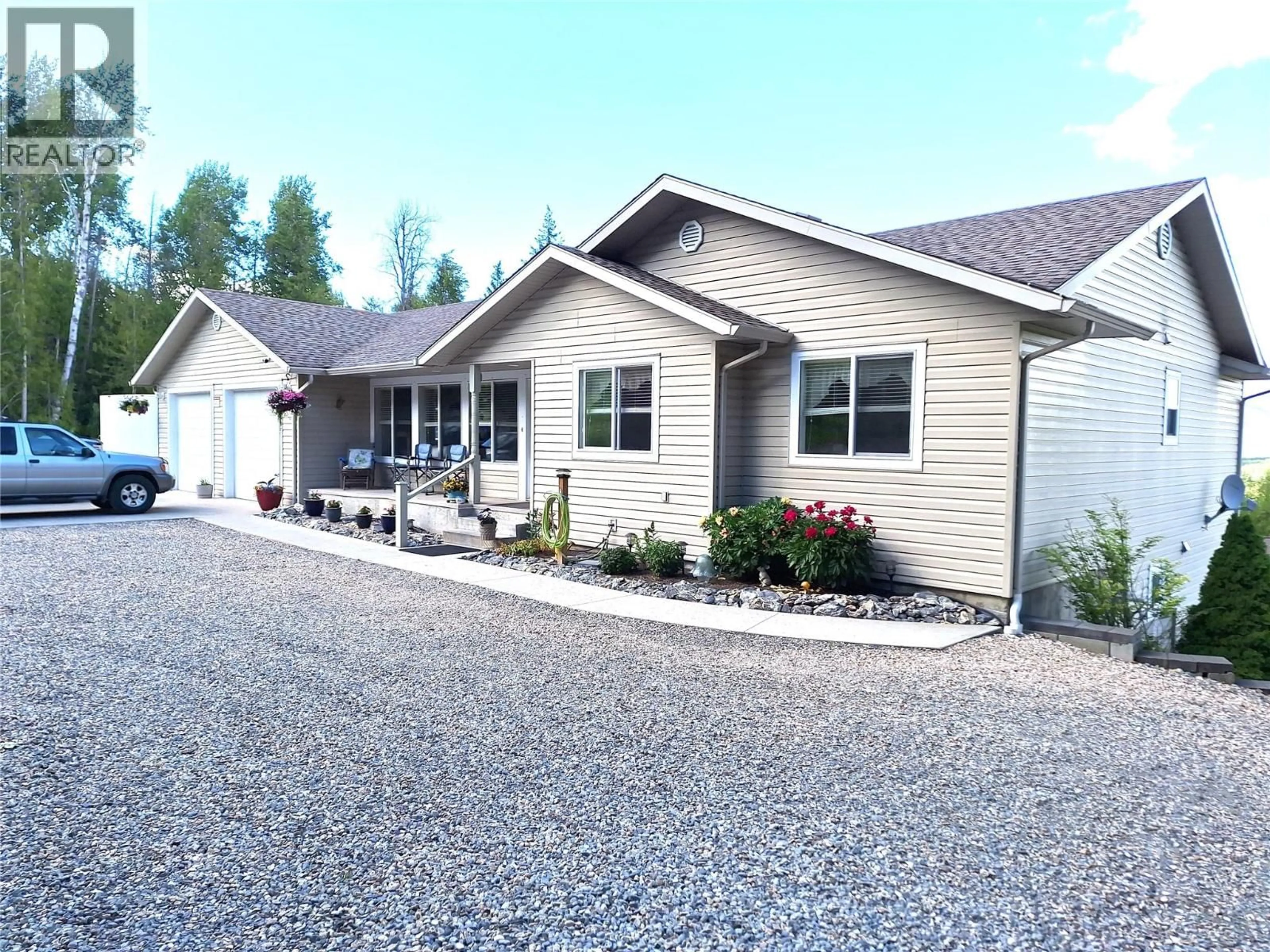 Home with vinyl exterior material, street for 1406 HUCKLEBERRY DRIVE, Sorrento British Columbia V0E2W1