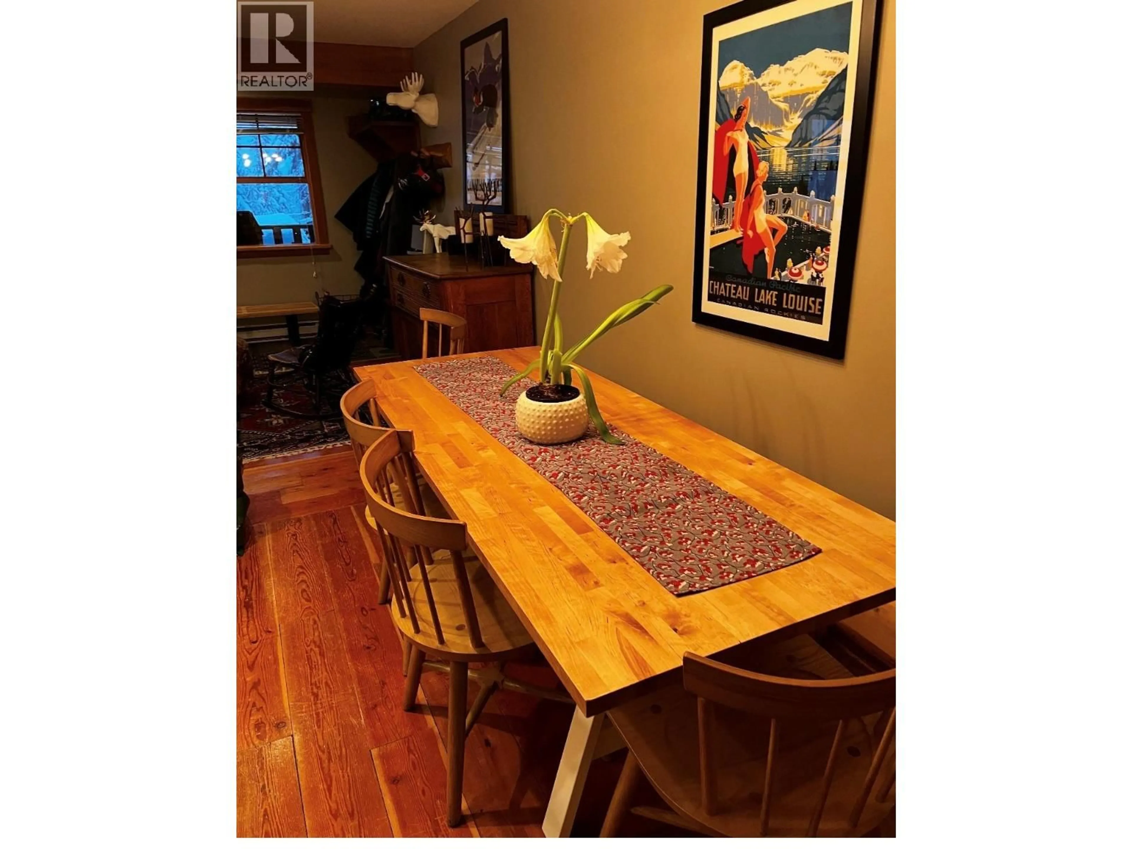 Dining room, wood/laminate floor for 4809 C SNOW PINES ROAD, Big White British Columbia V1P1P3
