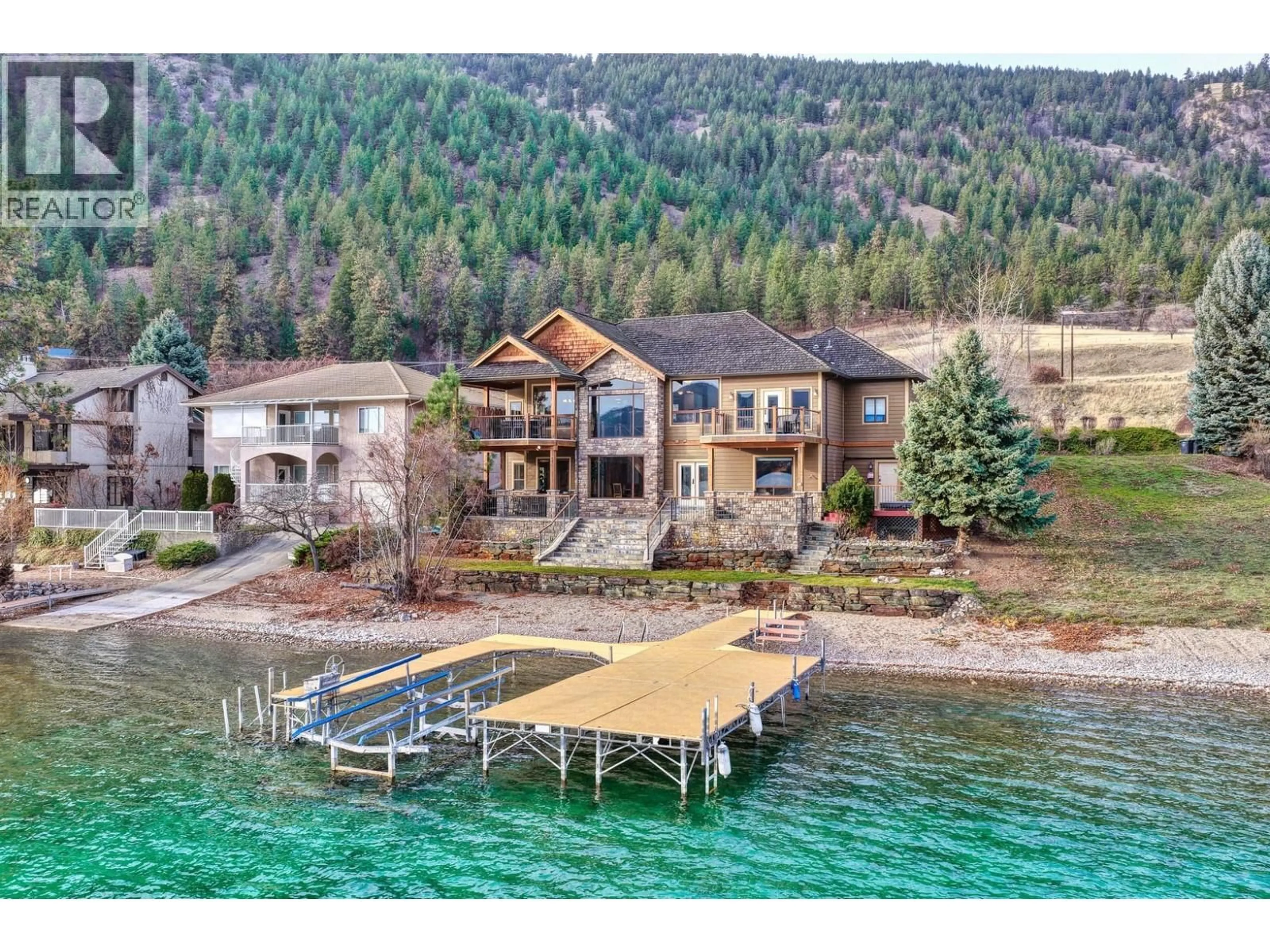 A pic from outside/outdoor area/front of a property/back of a property/a pic from drone, water/lake/river/ocean view for 8 - 17211 THOMSON ROAD, Oyama British Columbia V4V2K3