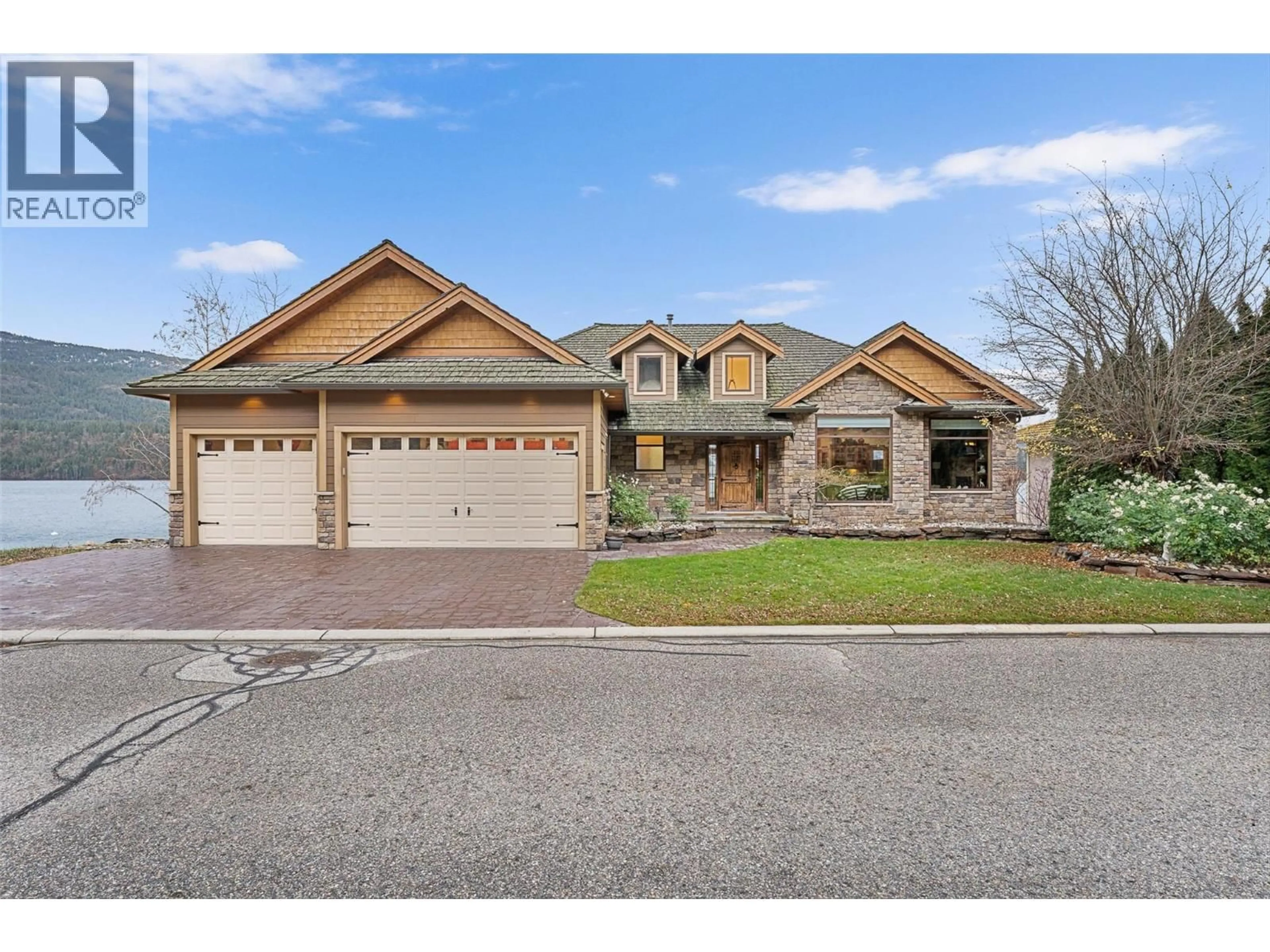 Home with brick exterior material, street for 8 - 17211 THOMSON ROAD, Oyama British Columbia V4V2K3