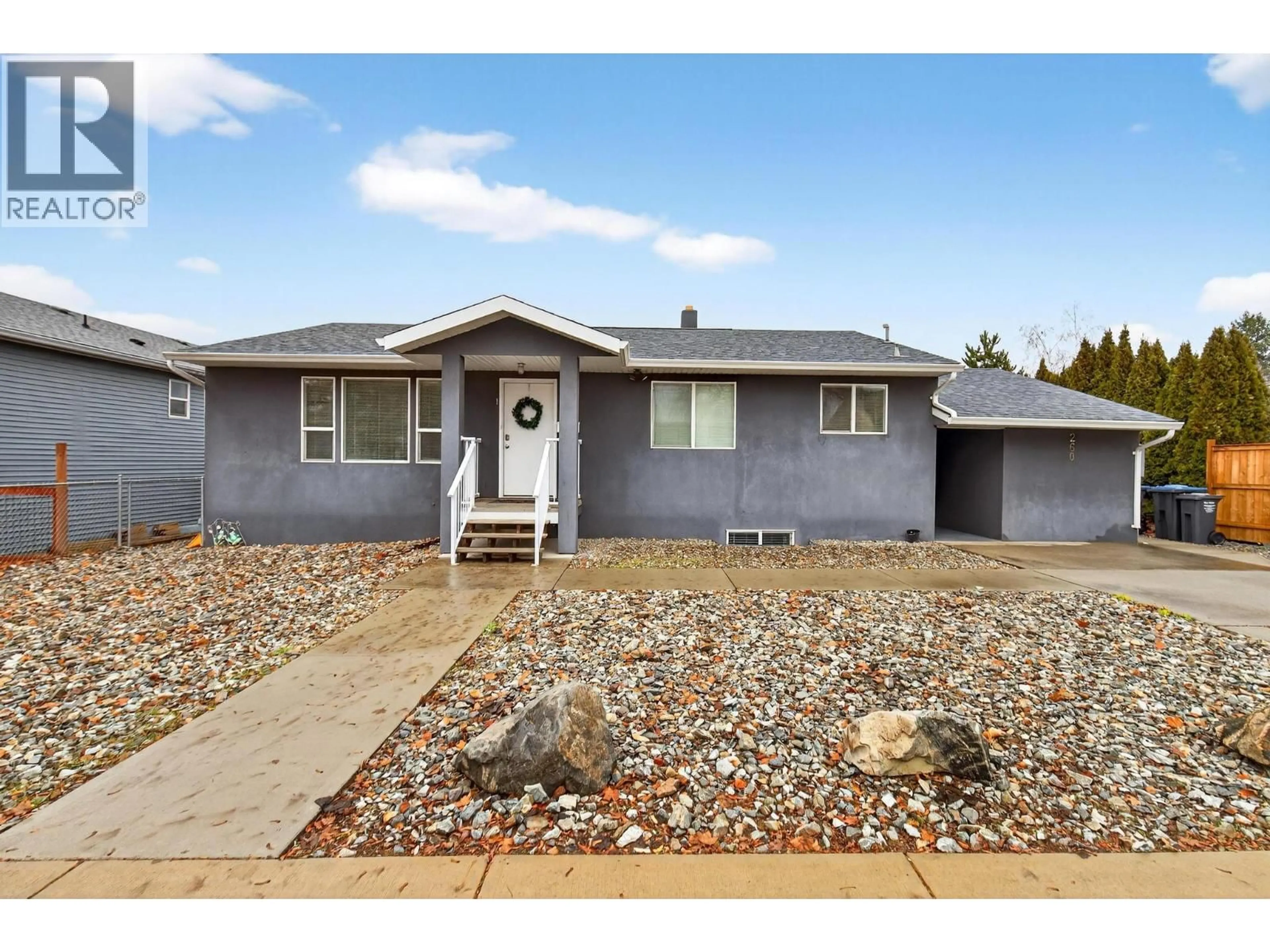 Home with vinyl exterior material, street for 260 PONTO ROAD, Kelowna British Columbia V1X2G1