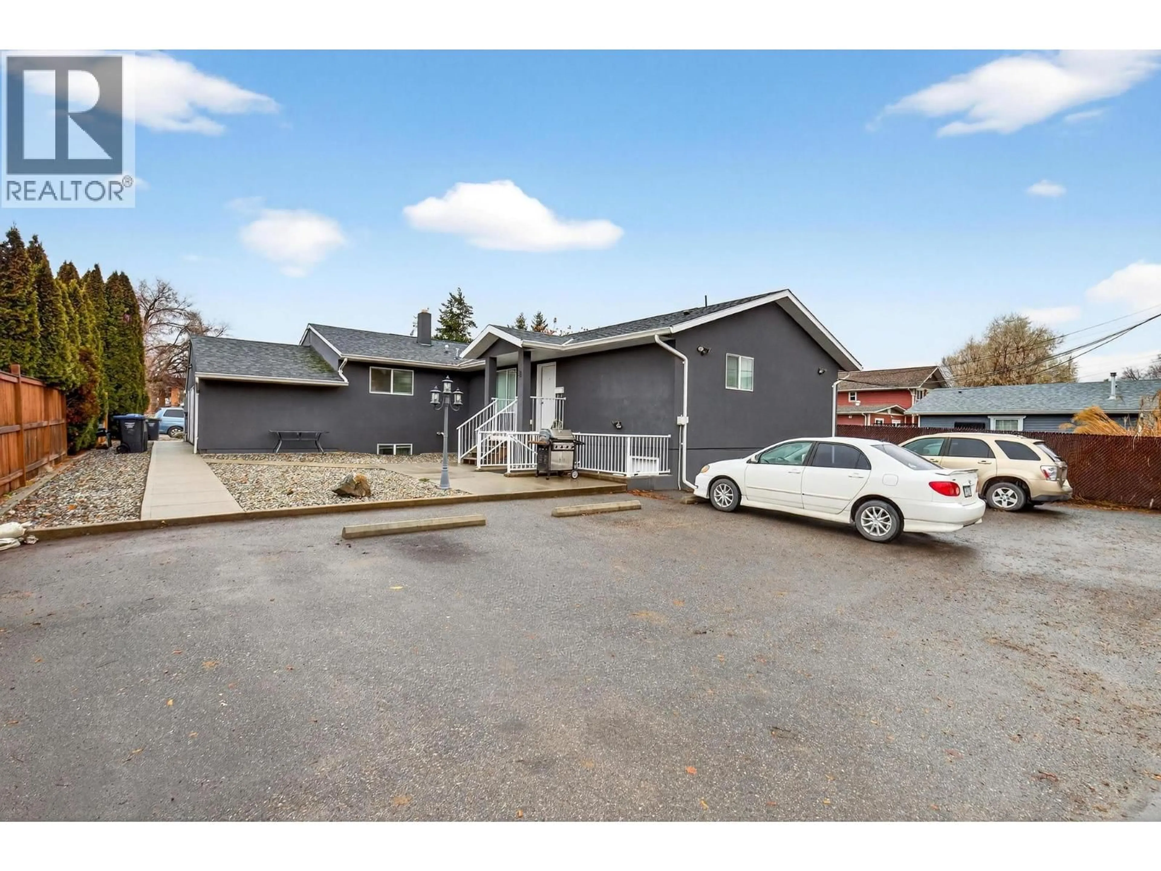 A pic from outside/outdoor area/front of a property/back of a property/a pic from drone, street for 260 PONTO ROAD, Kelowna British Columbia V1X2G1