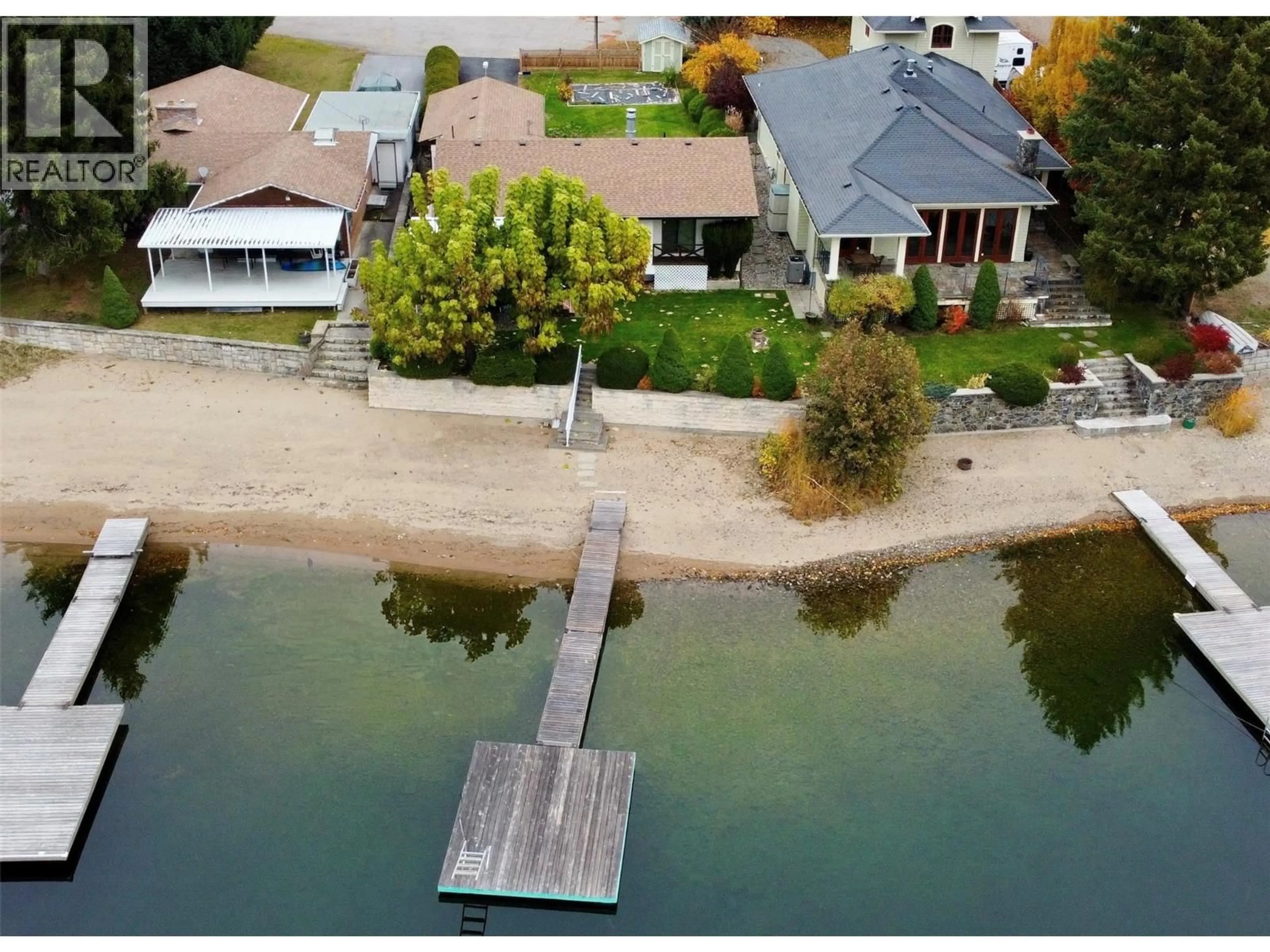 A pic from outside/outdoor area/front of a property/back of a property/a pic from drone, water/lake/river/ocean view for 1995 KELLY COURT, Christina Lake British Columbia V0H1E0