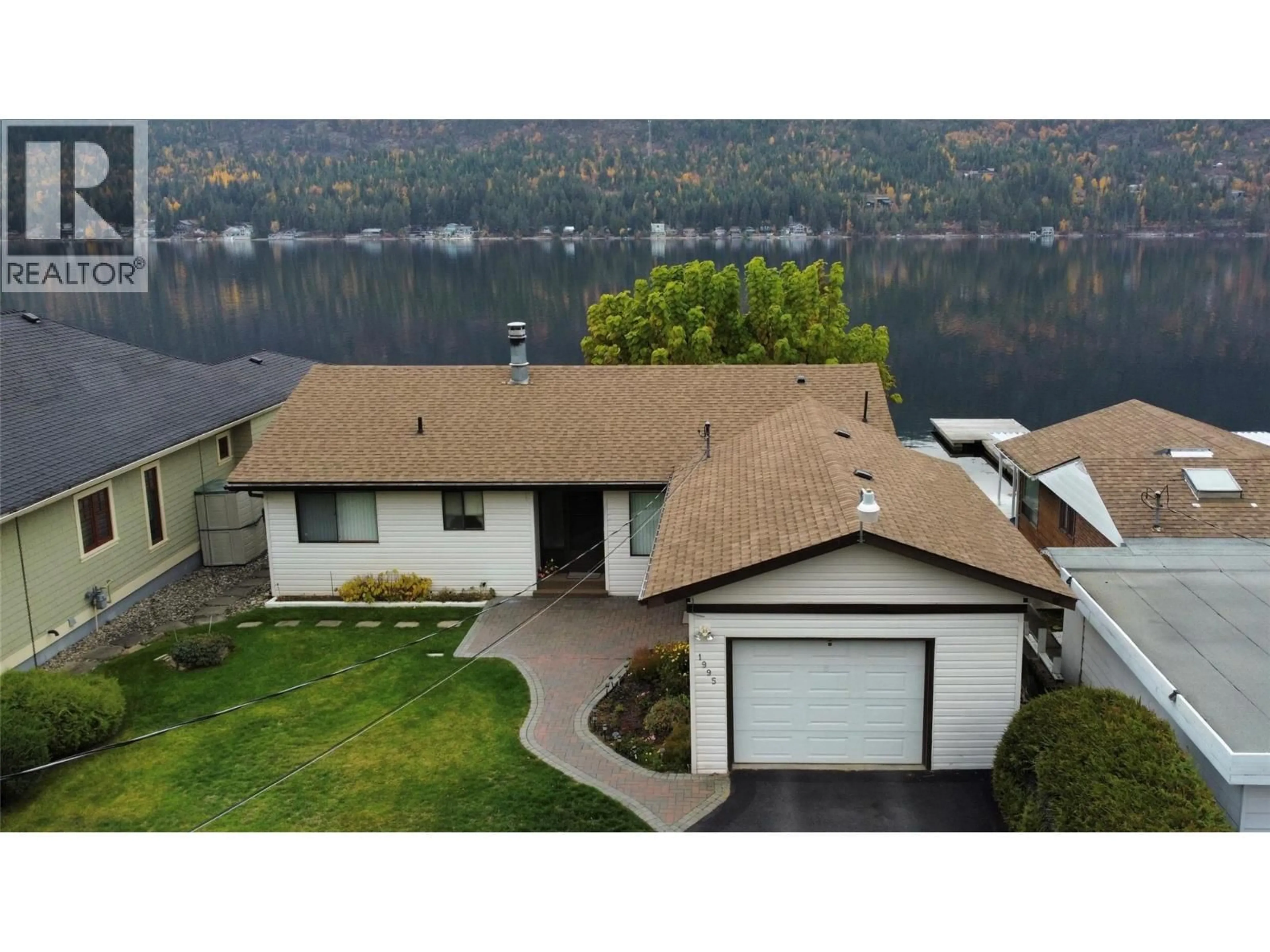 A pic from outside/outdoor area/front of a property/back of a property/a pic from drone, water/lake/river/ocean view for 1995 KELLY COURT, Christina Lake British Columbia V0H1E0