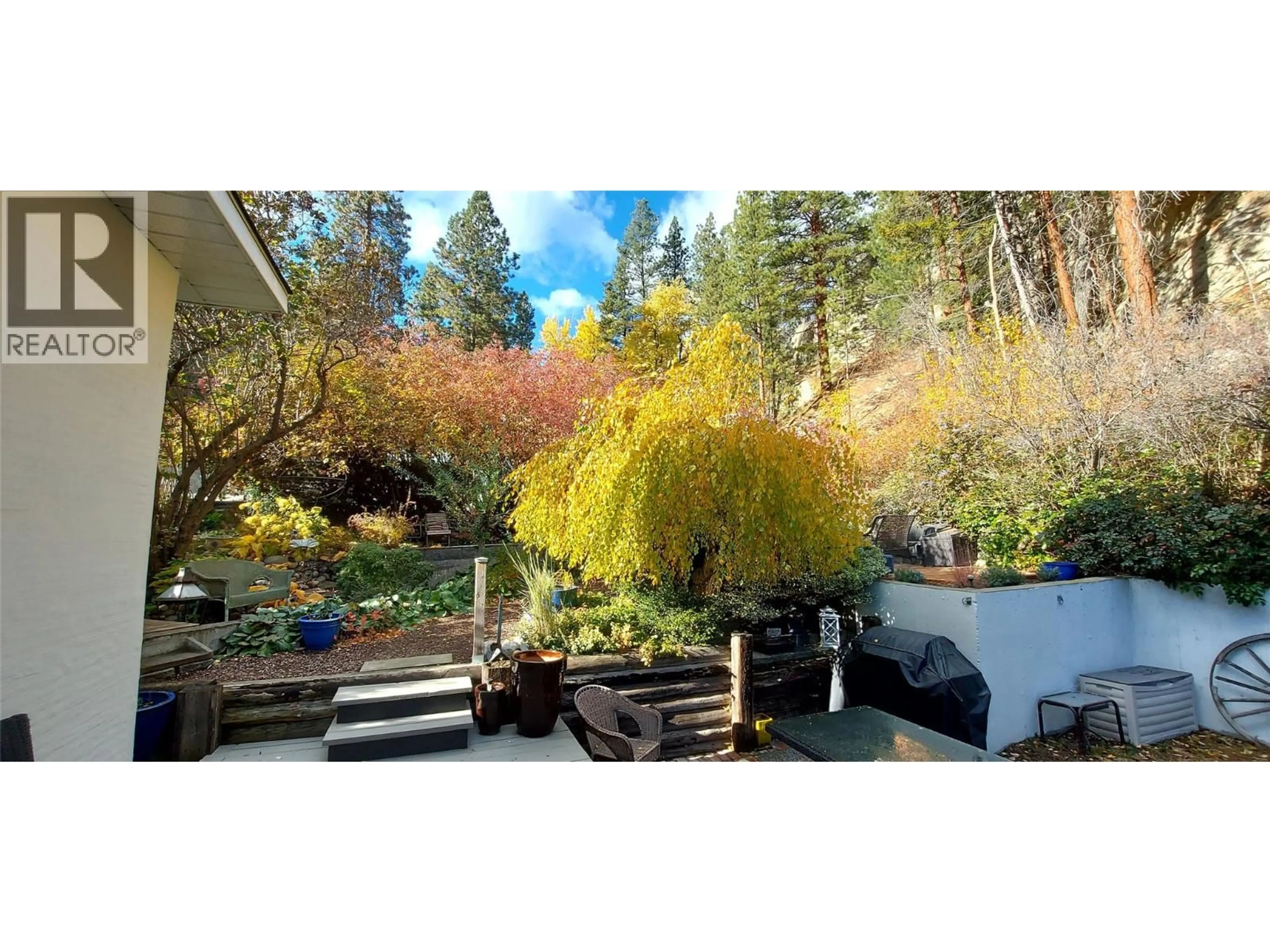 Patio, forest/trees view for 5706 BUTLER STREET, Summerland British Columbia V0H1Z1
