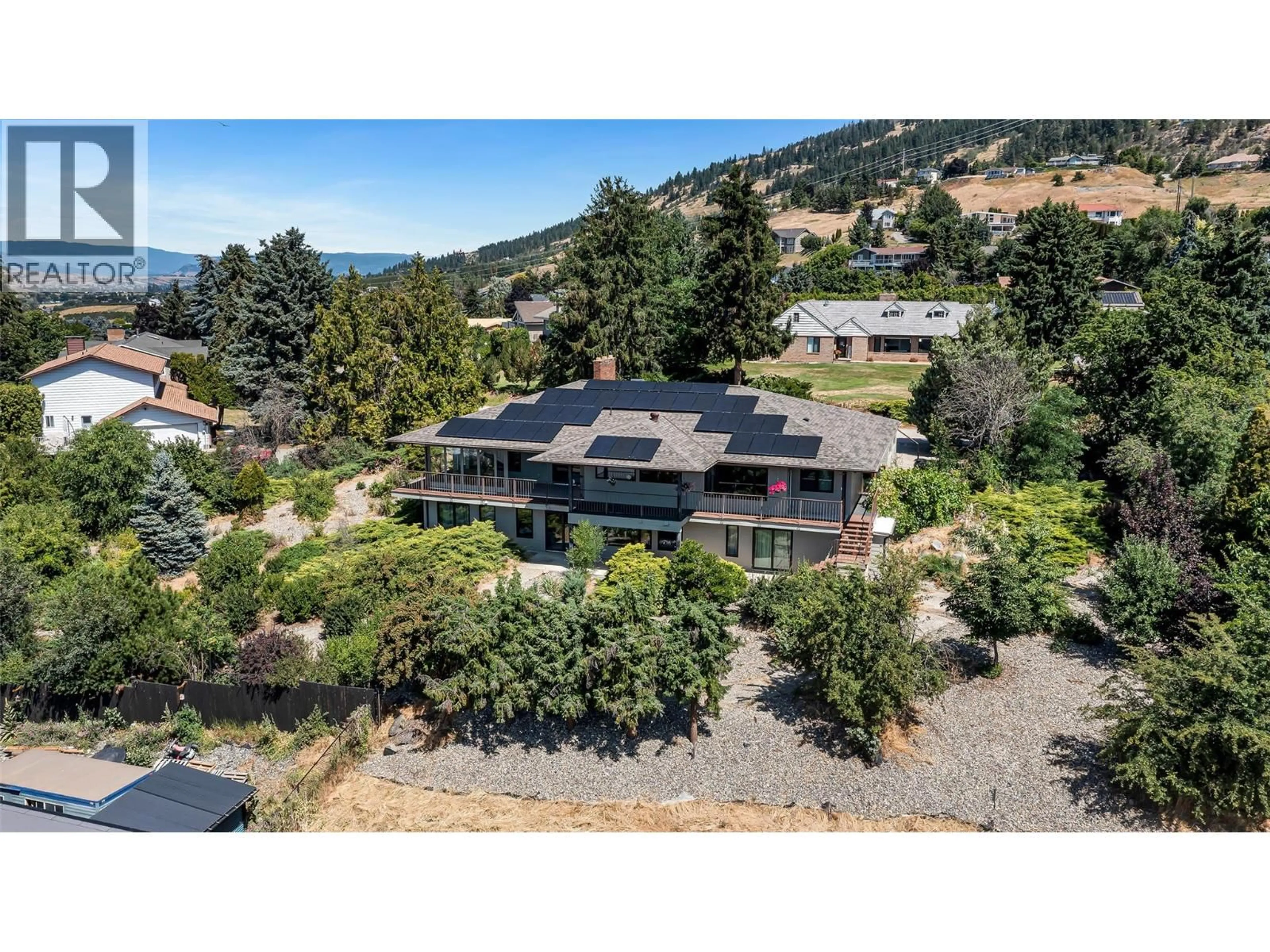 A pic from outside/outdoor area/front of a property/back of a property/a pic from drone, mountain view for 460 CRESTVIEW DRIVE, Coldstream British Columbia V1B2X6