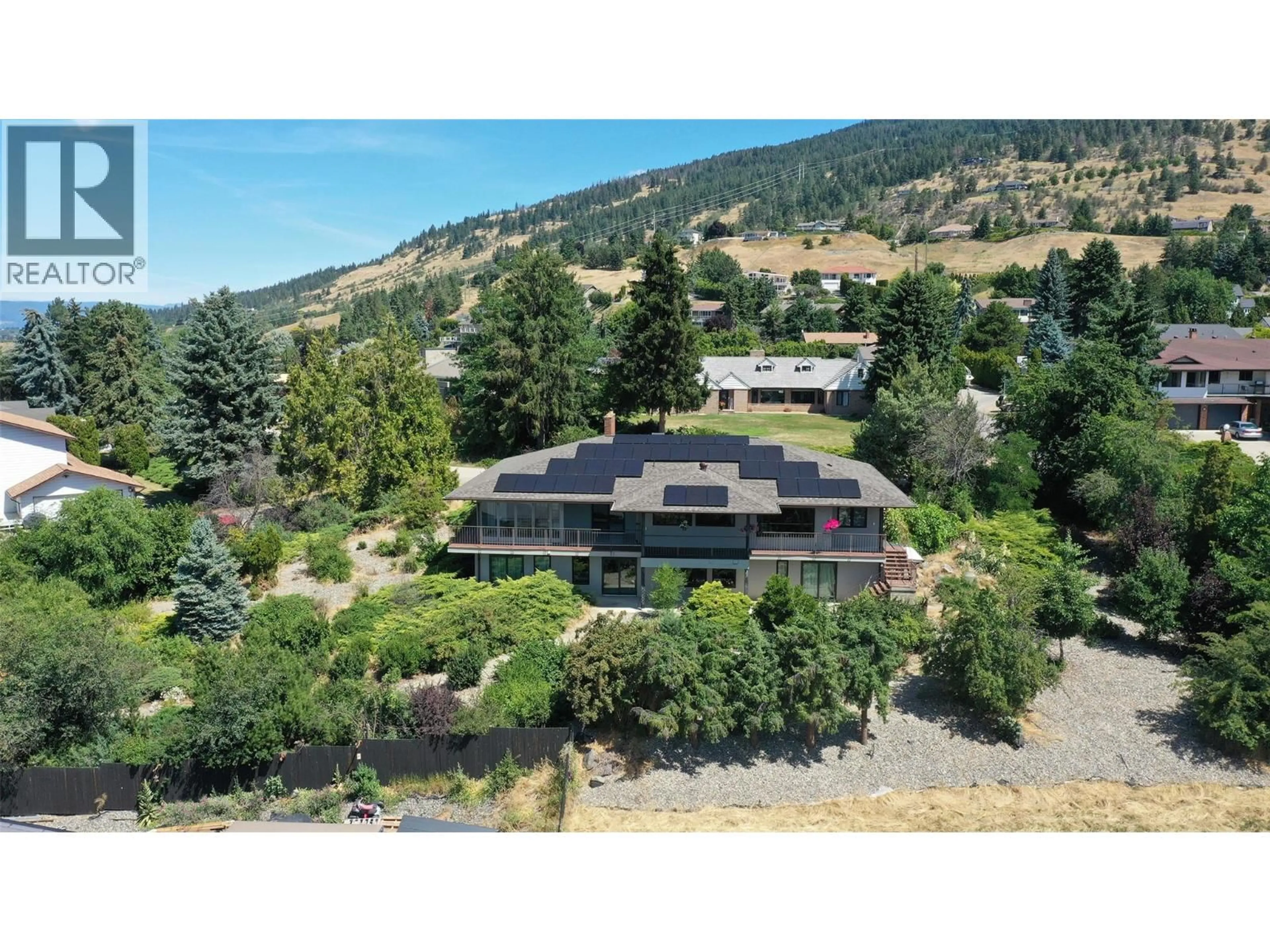 A pic from outside/outdoor area/front of a property/back of a property/a pic from drone, mountain view for 460 CRESTVIEW DRIVE, Coldstream British Columbia V1B2X6